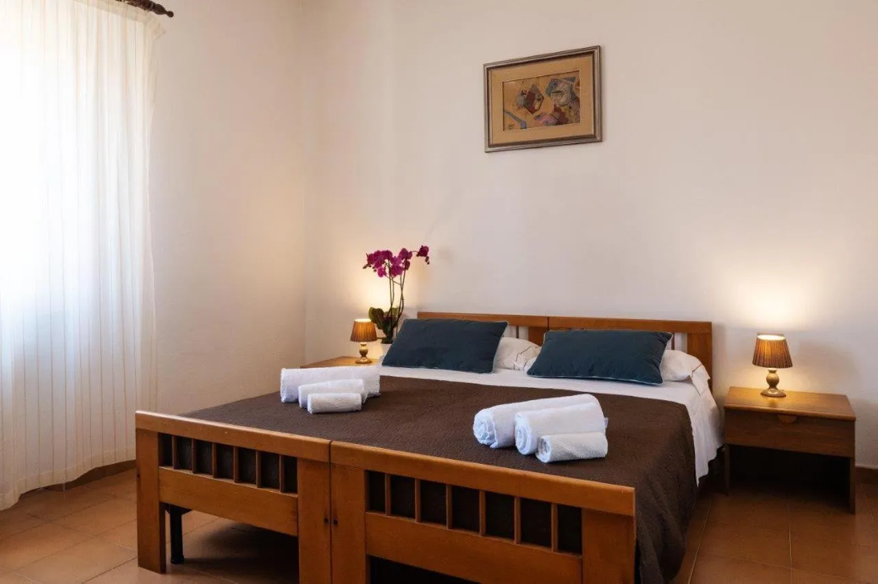 Bed in Hotel L'Aragosta