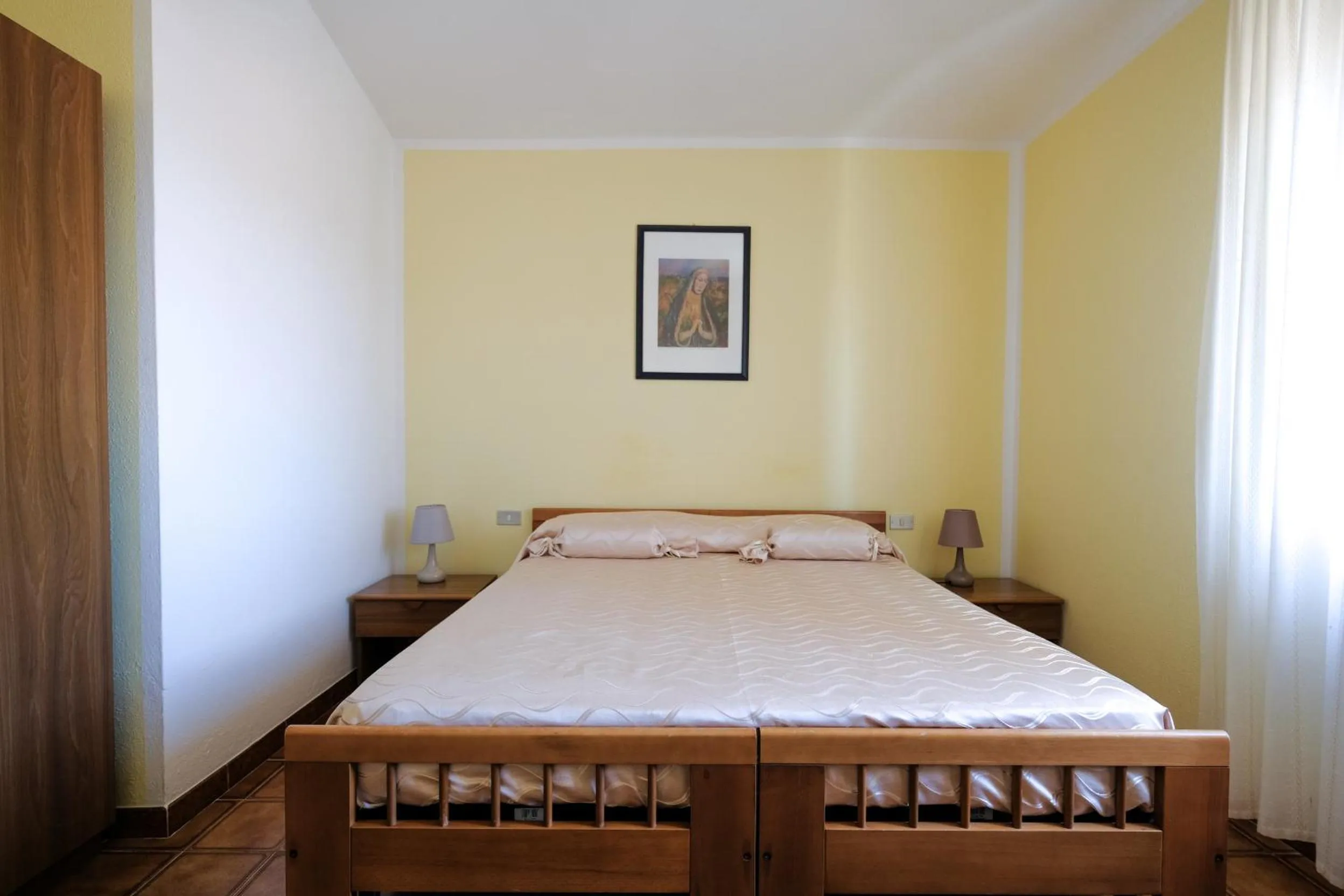 Bed in Hotel L'Aragosta