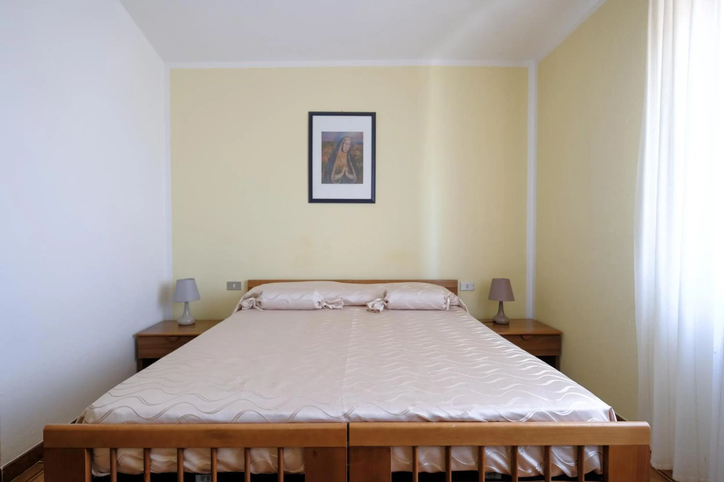 Bed in Hotel L'Aragosta