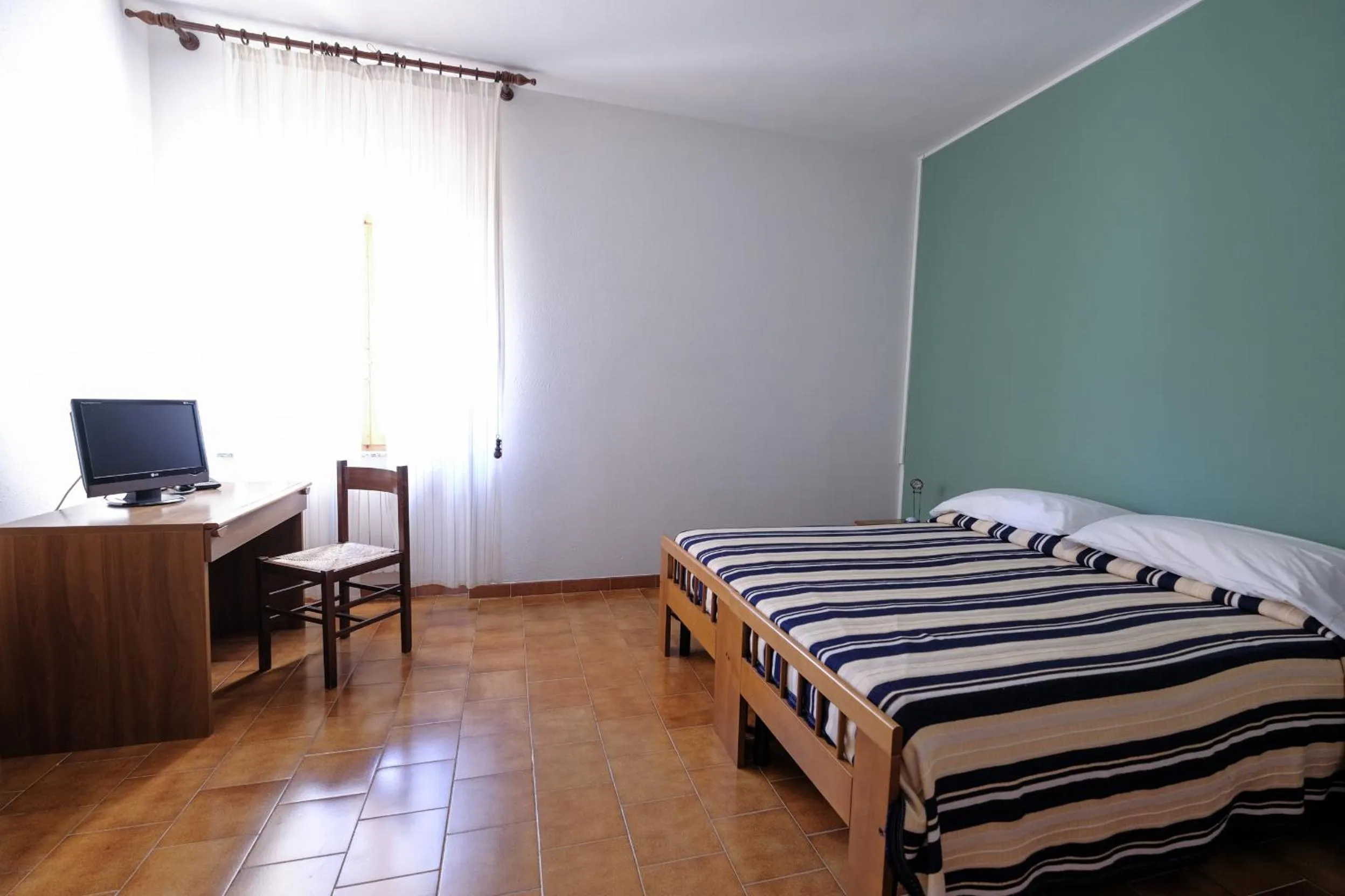 Bed in Hotel L'Aragosta