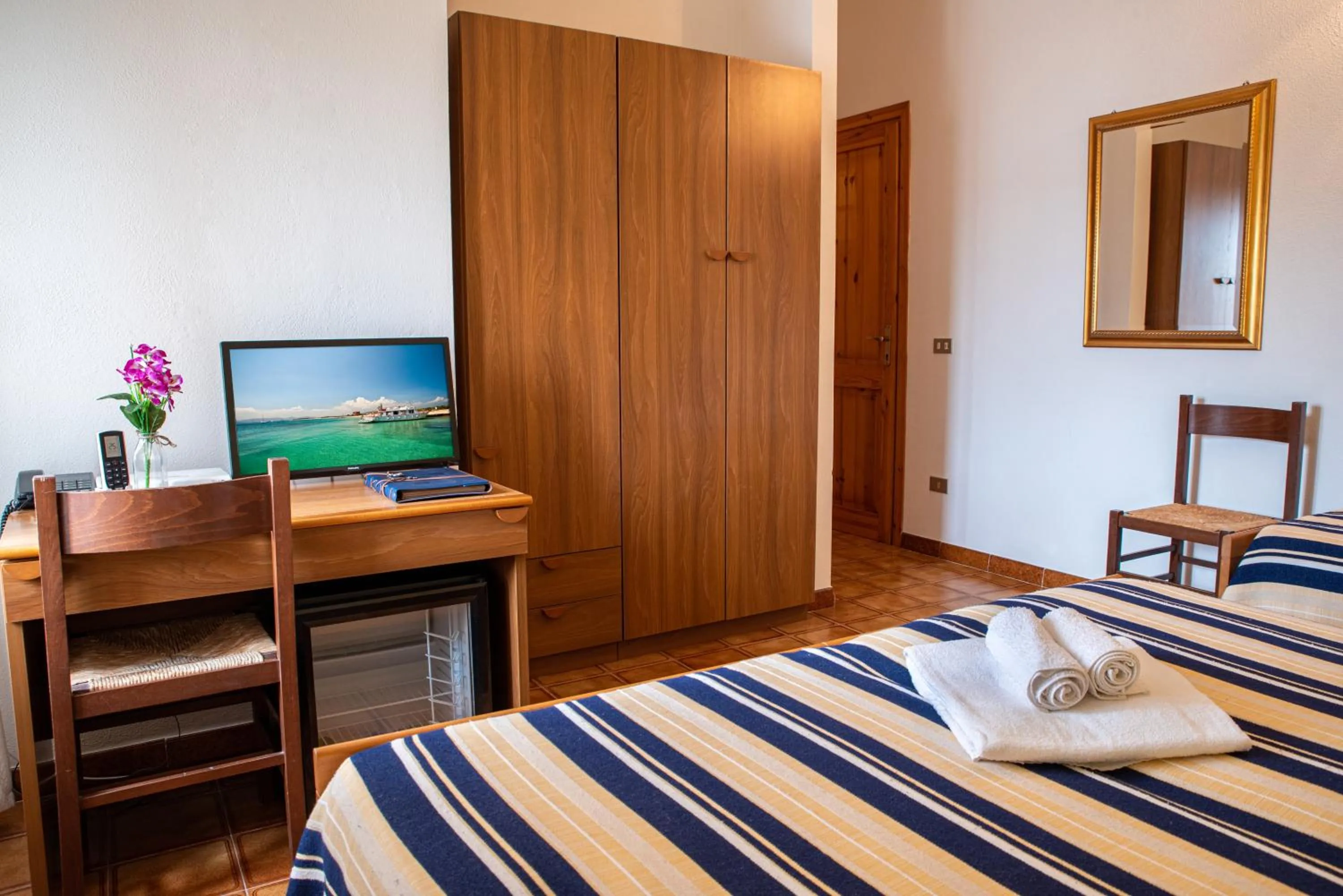 Bed in Hotel L'Aragosta