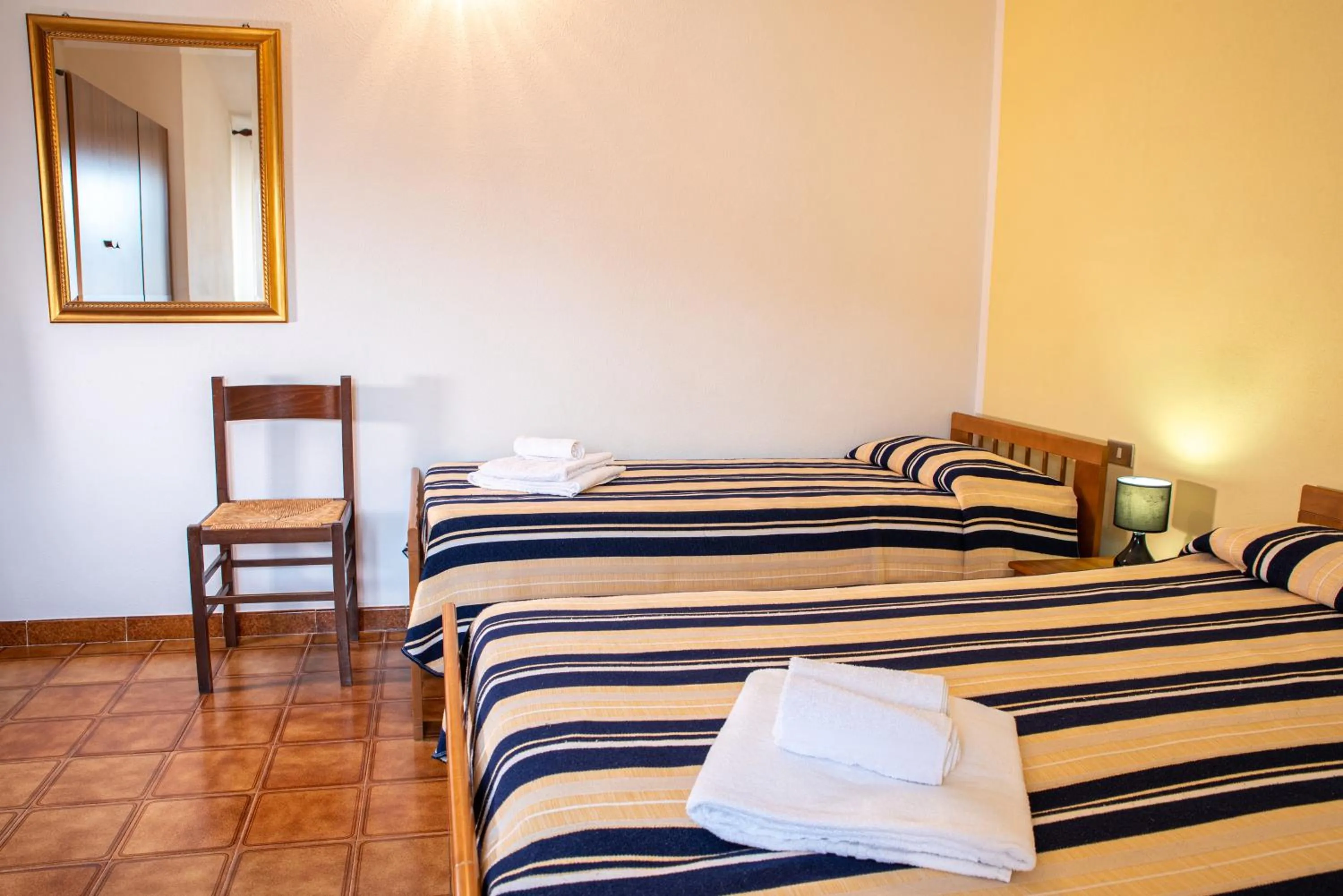 Bed in Hotel L'Aragosta