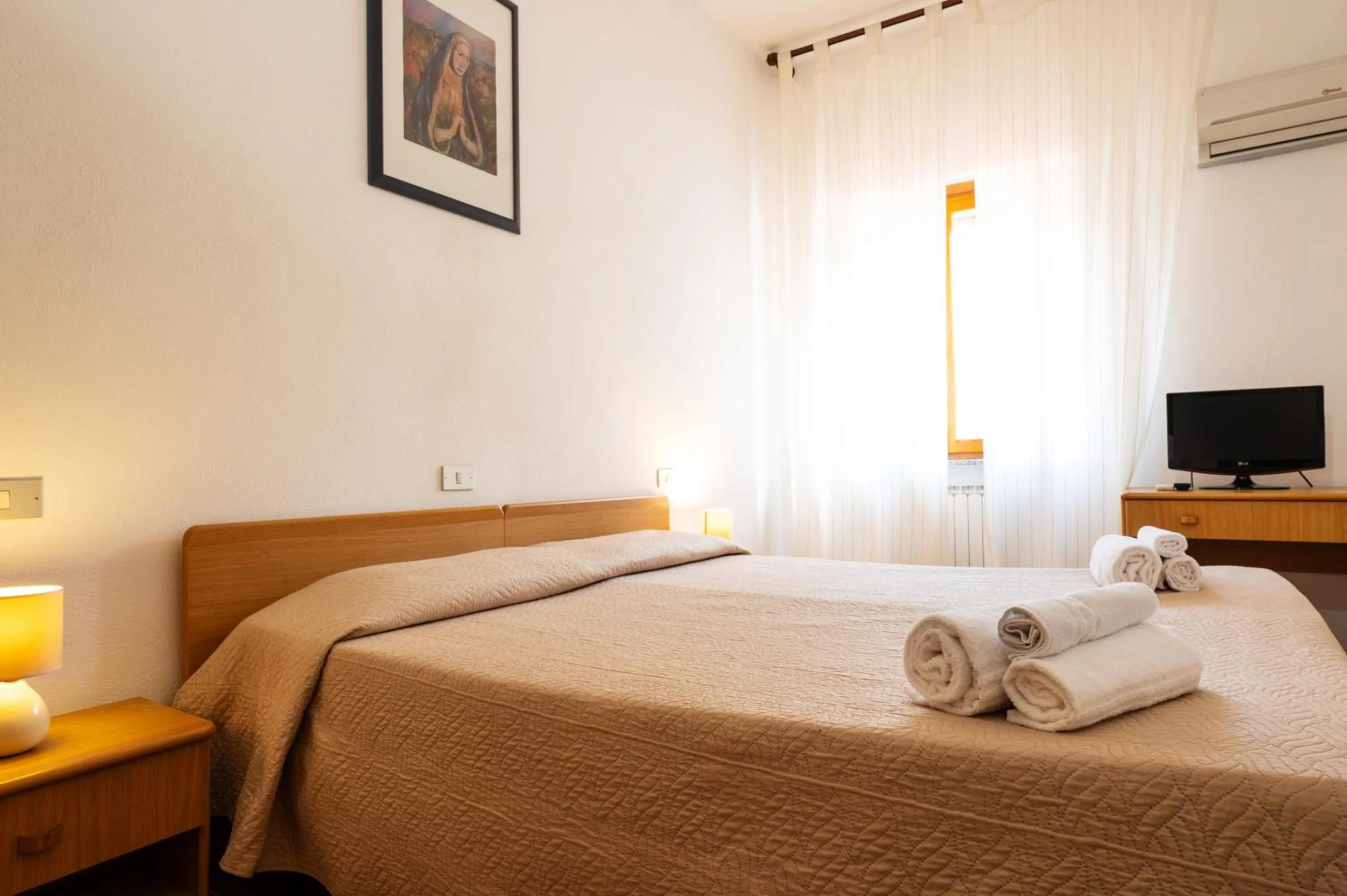 Bed in Hotel L'Aragosta