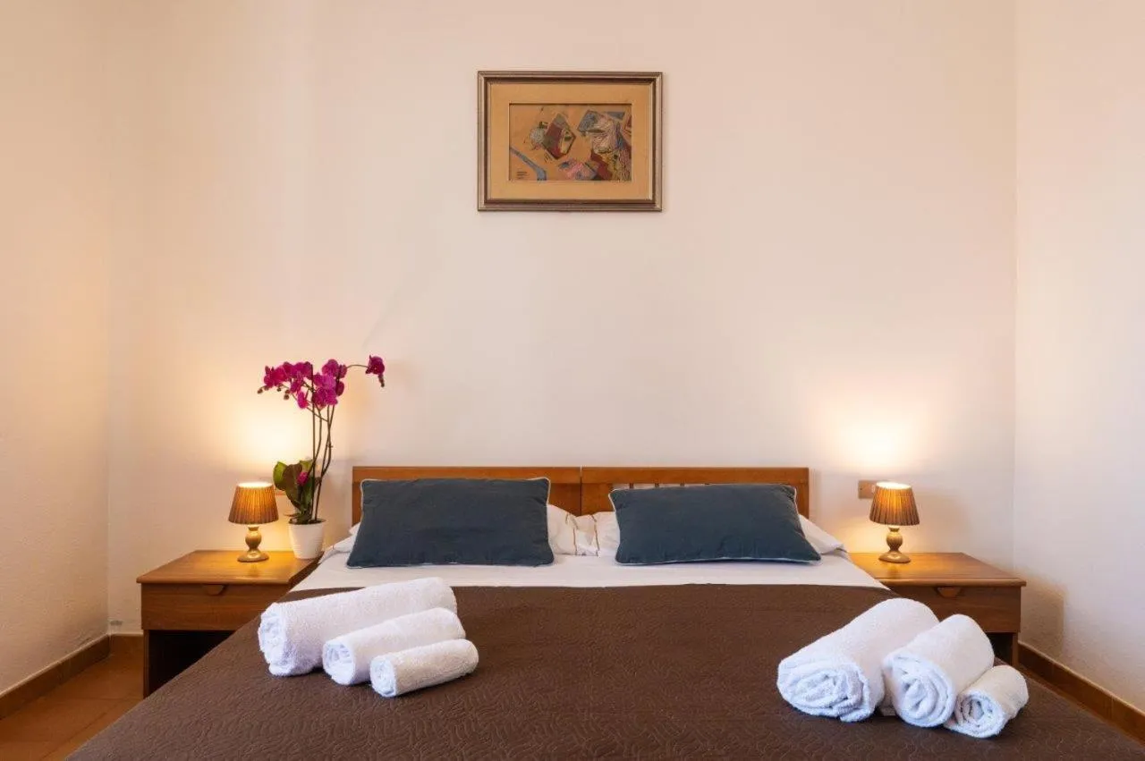 Bed in Hotel L'Aragosta