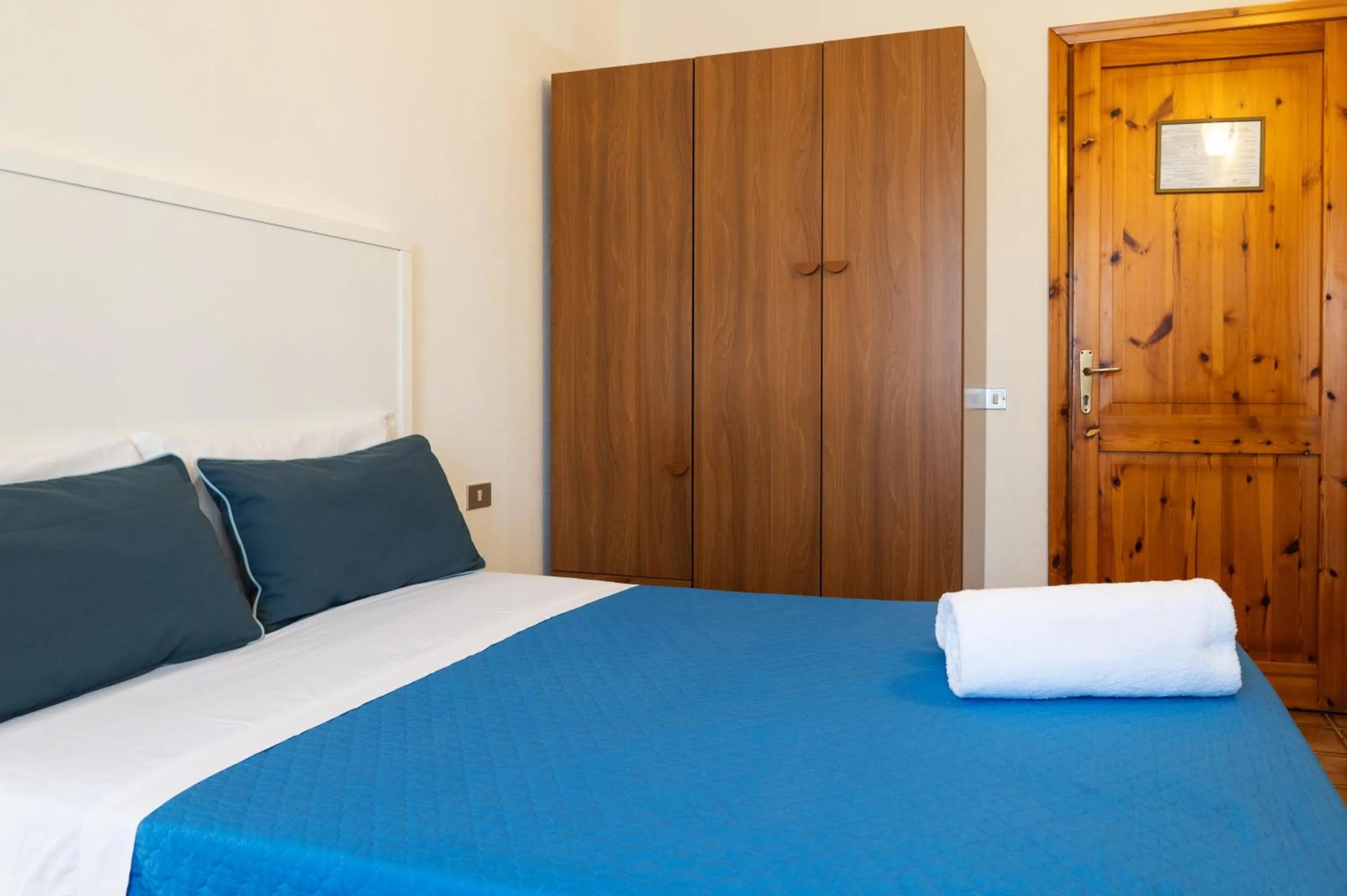 Bed in Hotel L'Aragosta