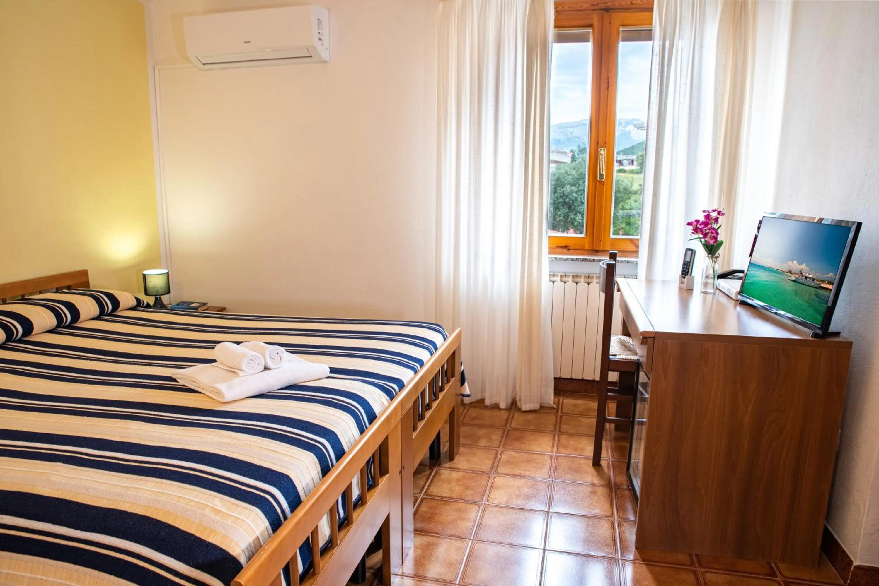 Bed in Hotel L'Aragosta