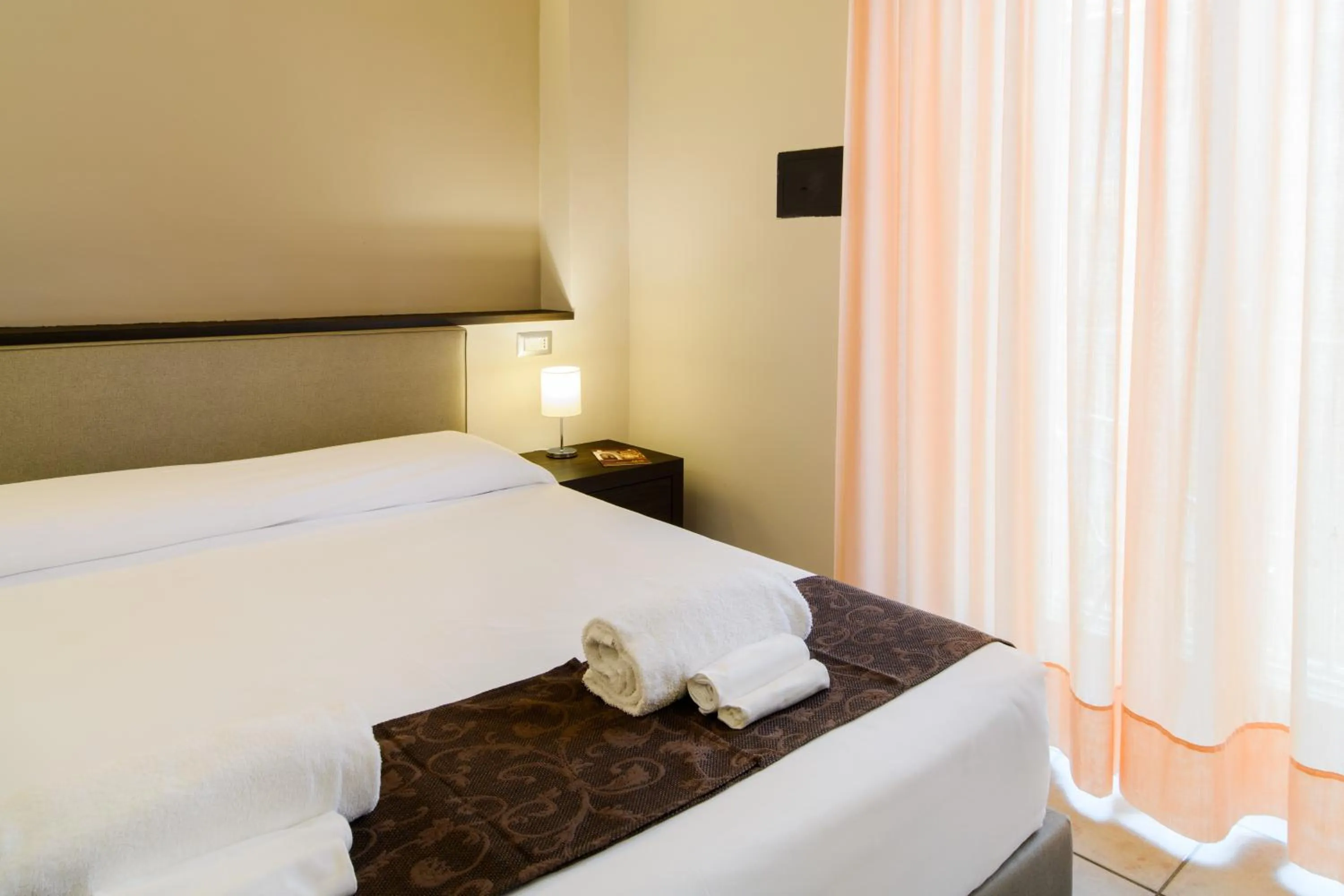 Bed in Hotel Tirreno