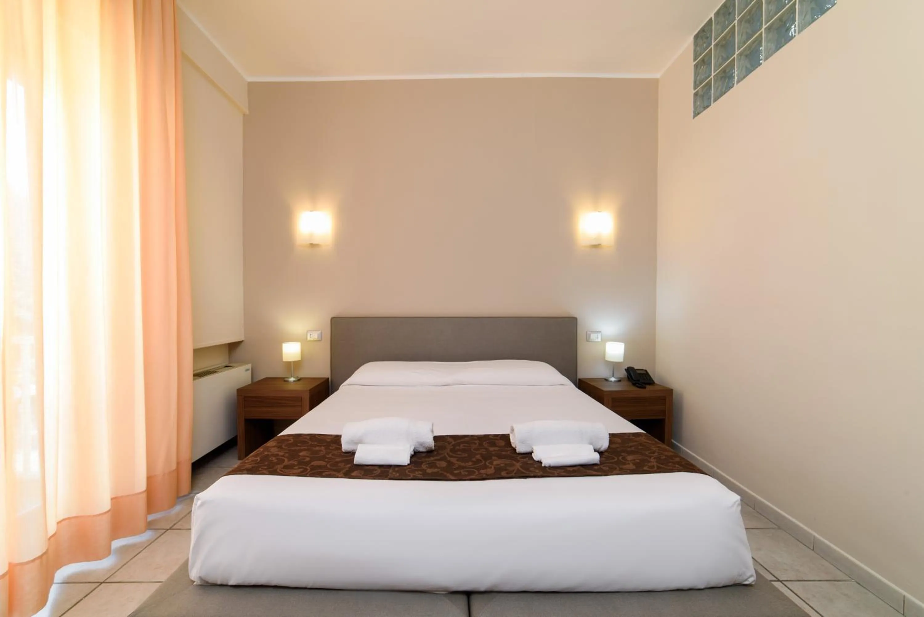 Bed in Hotel Tirreno