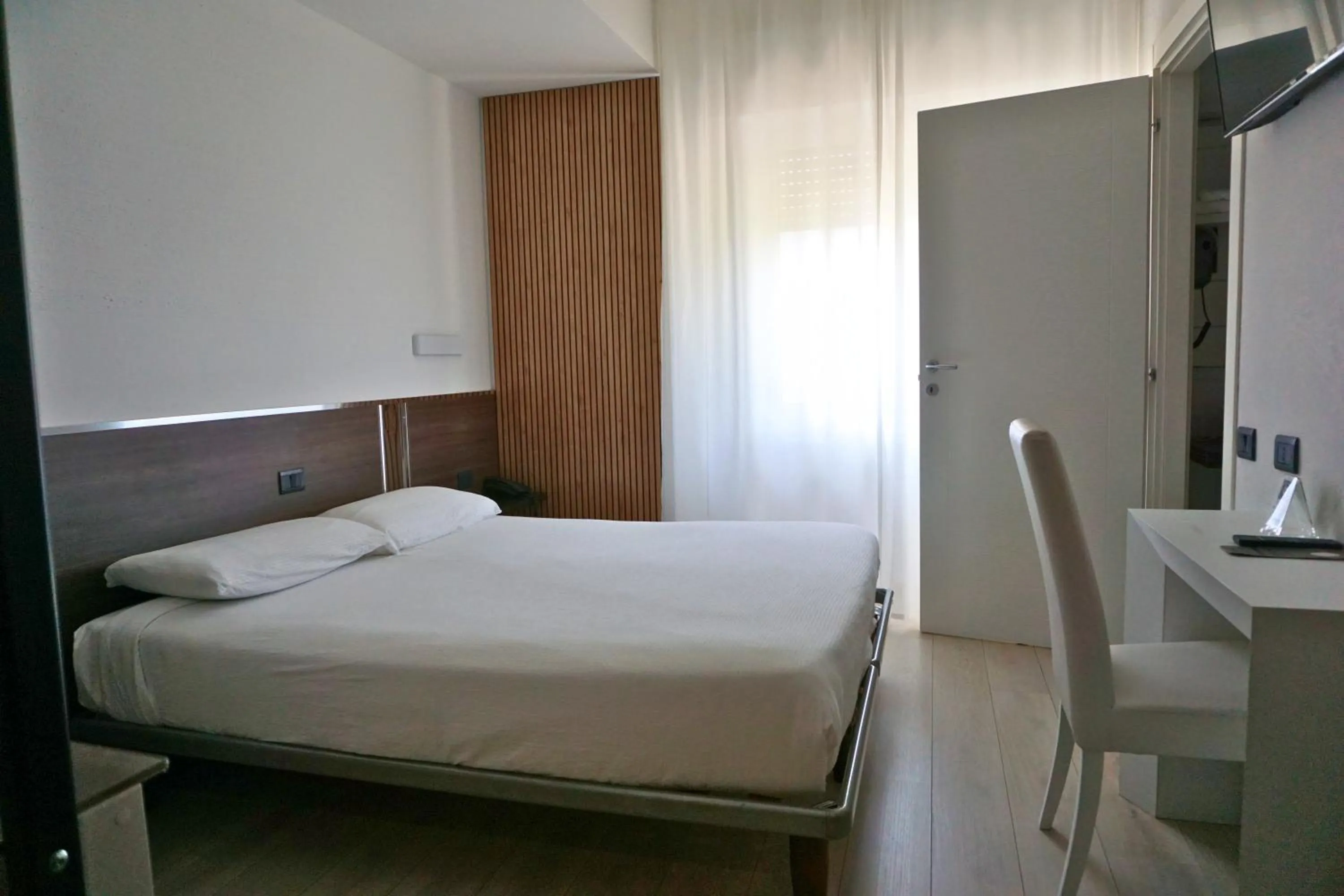 Bed in Hotel Isola Verde