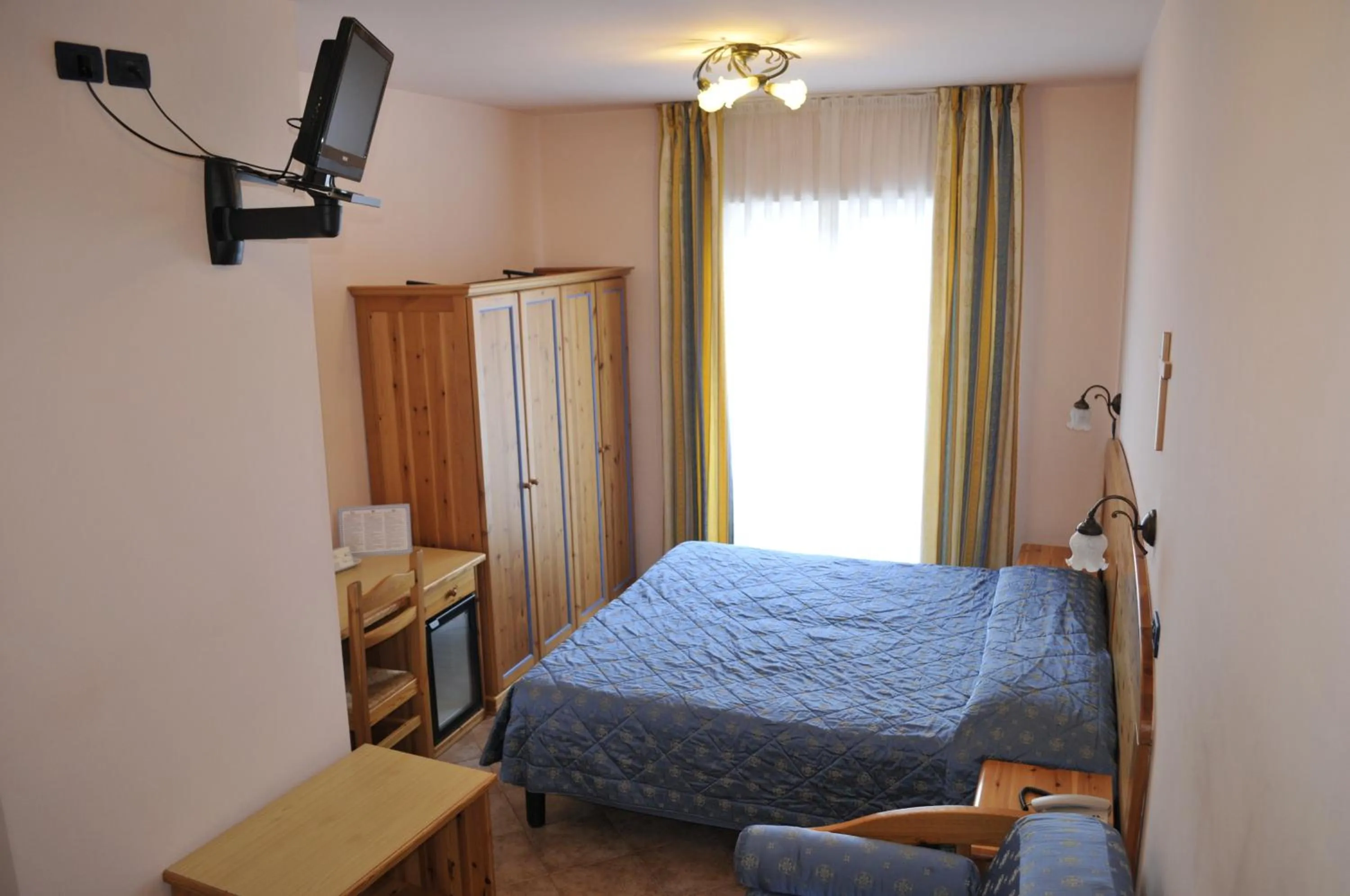 Bed in Hotel Vittoria