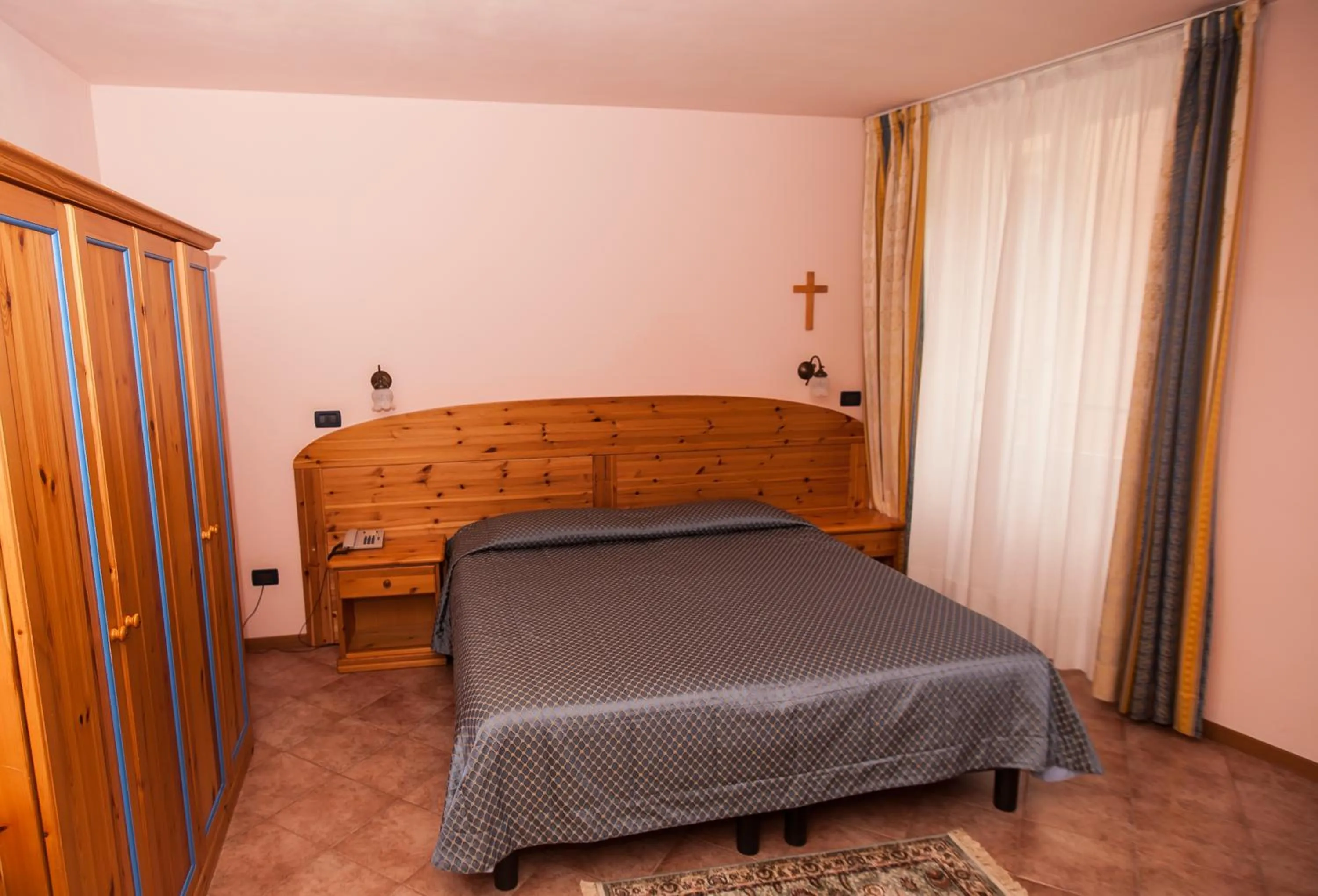 Bed in Hotel Vittoria