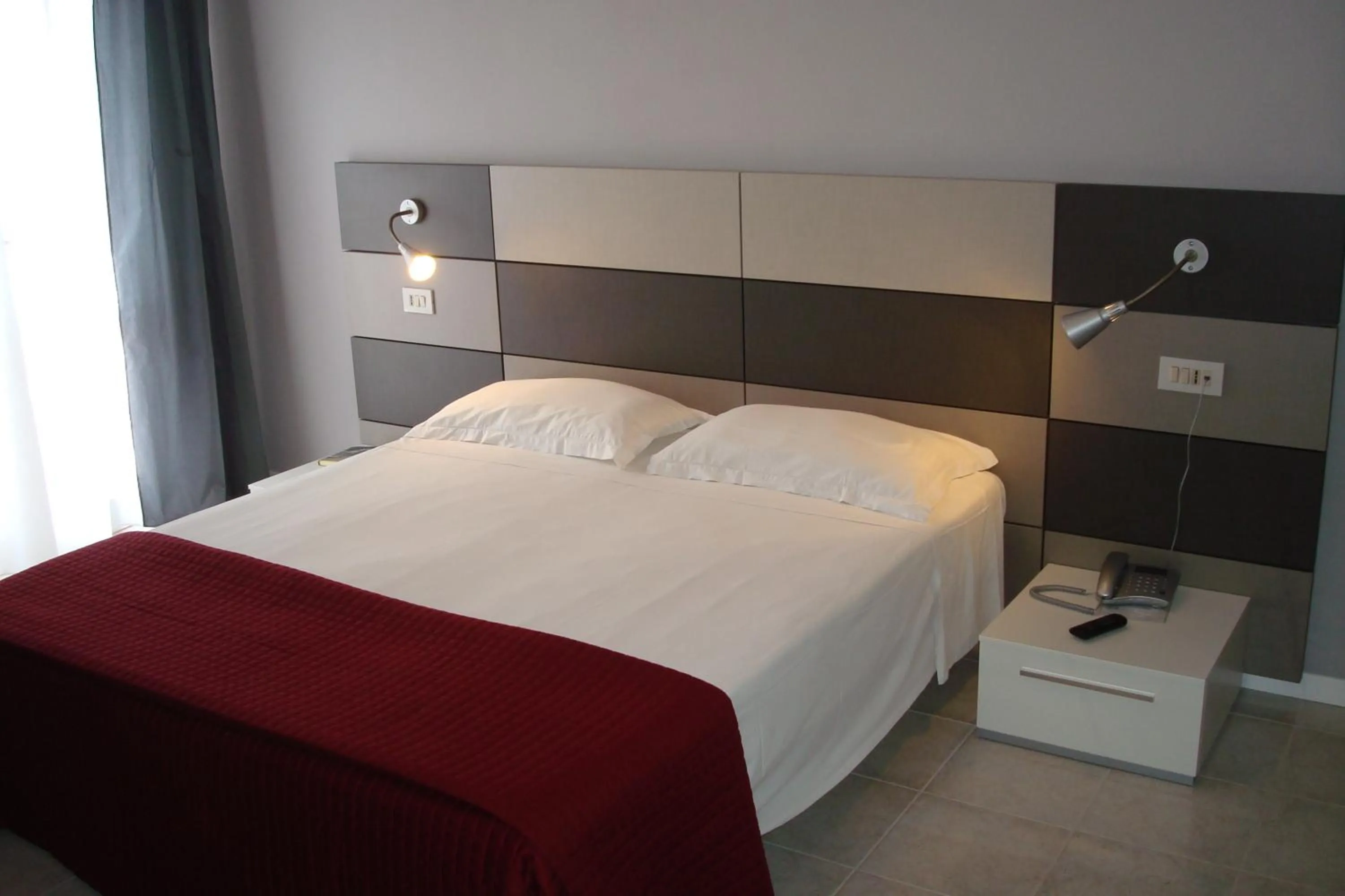 Bed in Hotel Gardenia