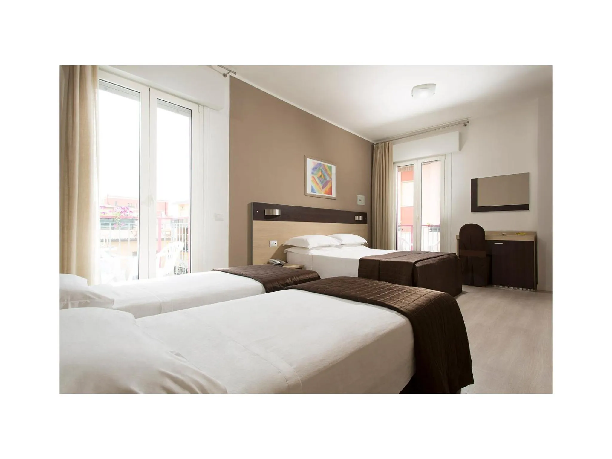 Bed in Hotel Gardenia