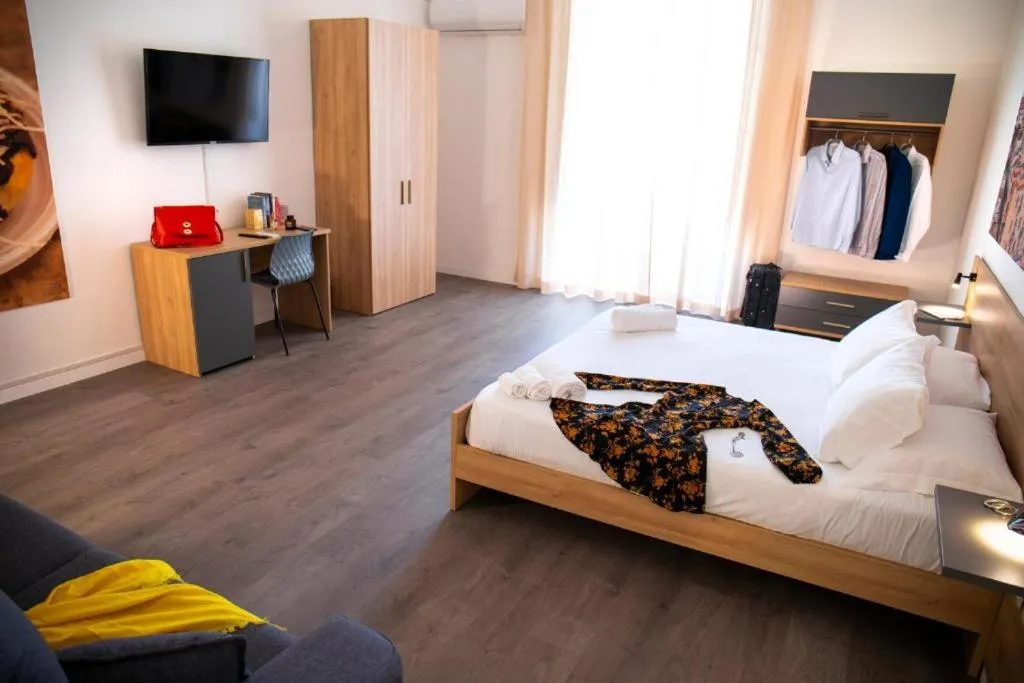 Bed in Ballaro' Hotel - Budget Room