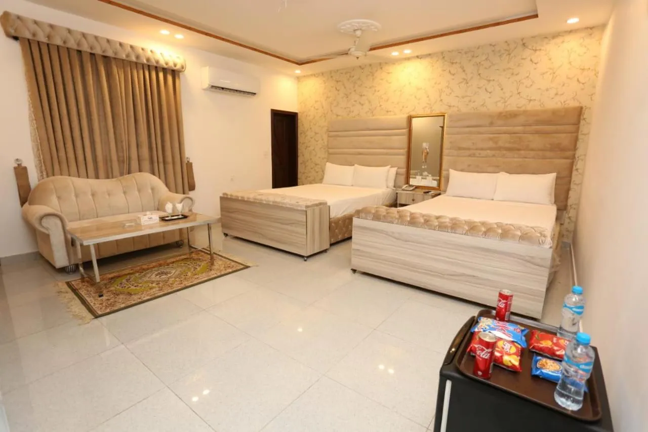Photo of the whole room, Bed in Grand Swiss Hotel&Apartment Lahore