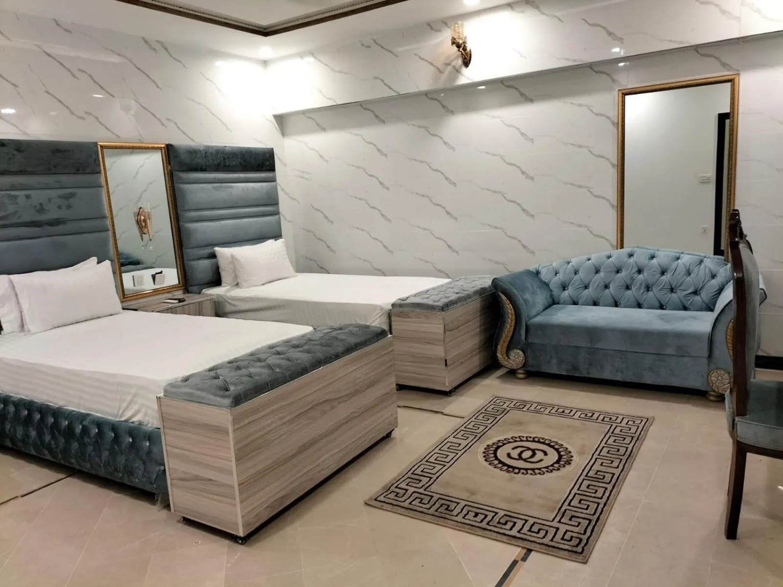 Living room, Bed in Grand Swiss Hotel&Apartment Lahore