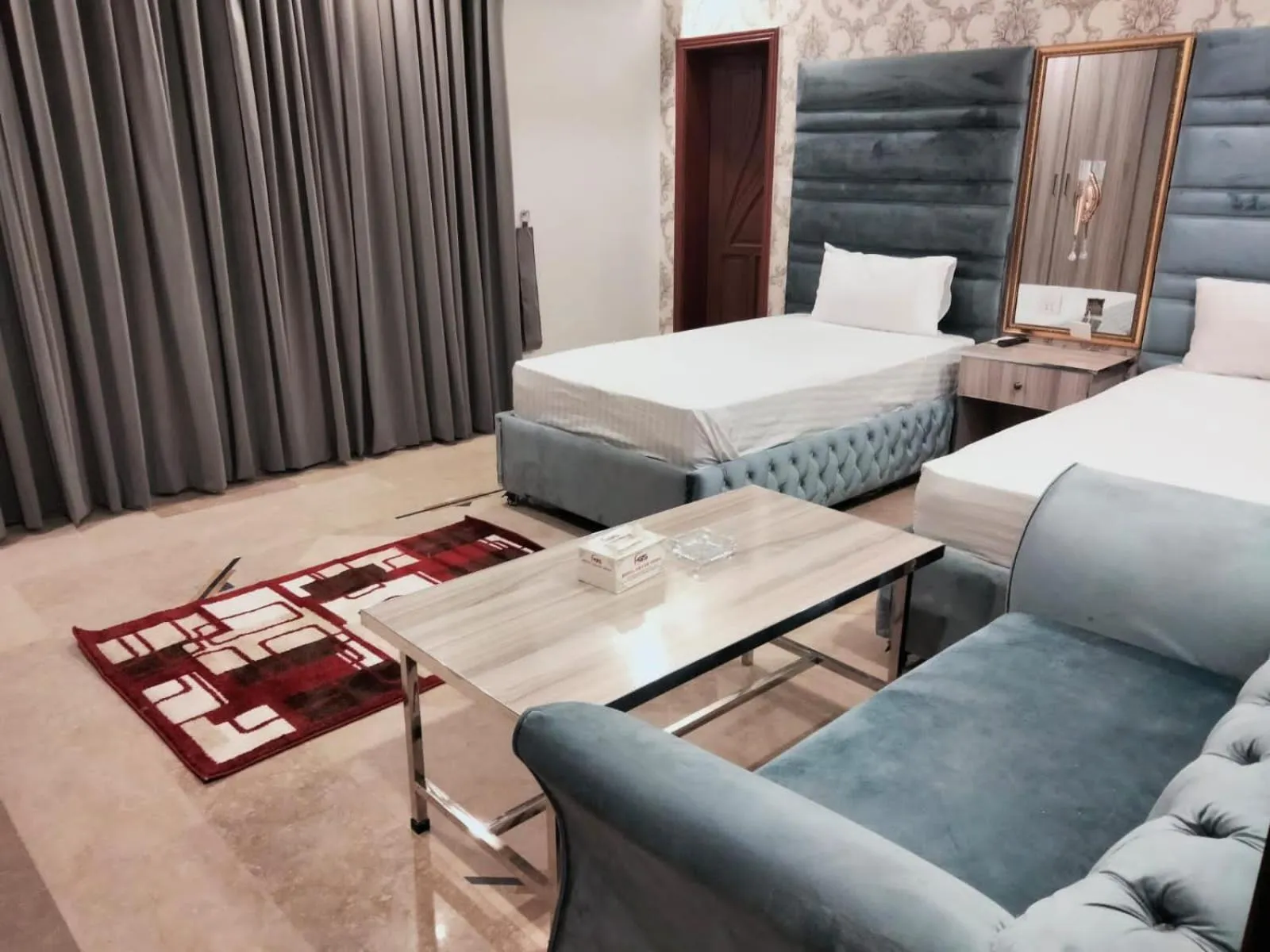 Photo of the whole room, Bed in Grand Swiss Hotel&Apartment Lahore