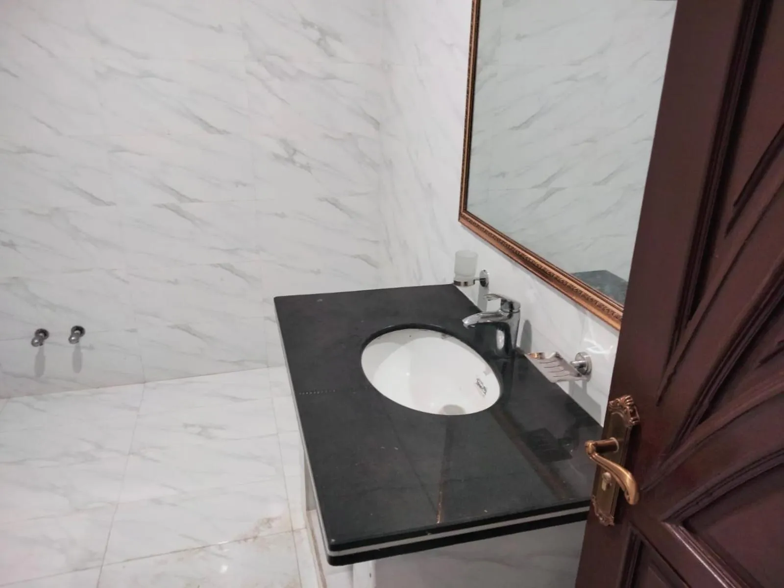 Bathroom in Grand Swiss Hotel&Apartment Lahore
