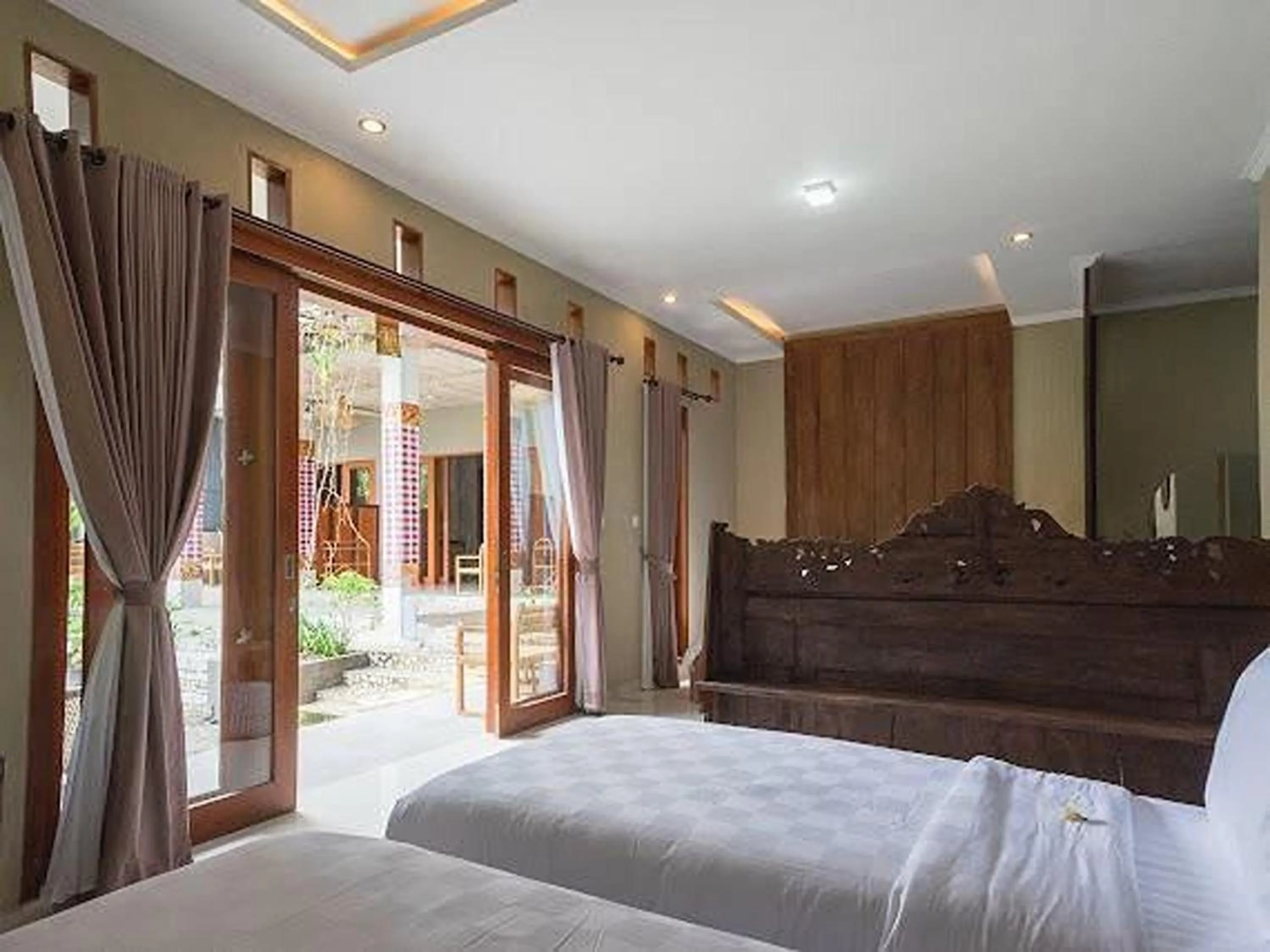 Bed in Nayaka Living Ubud