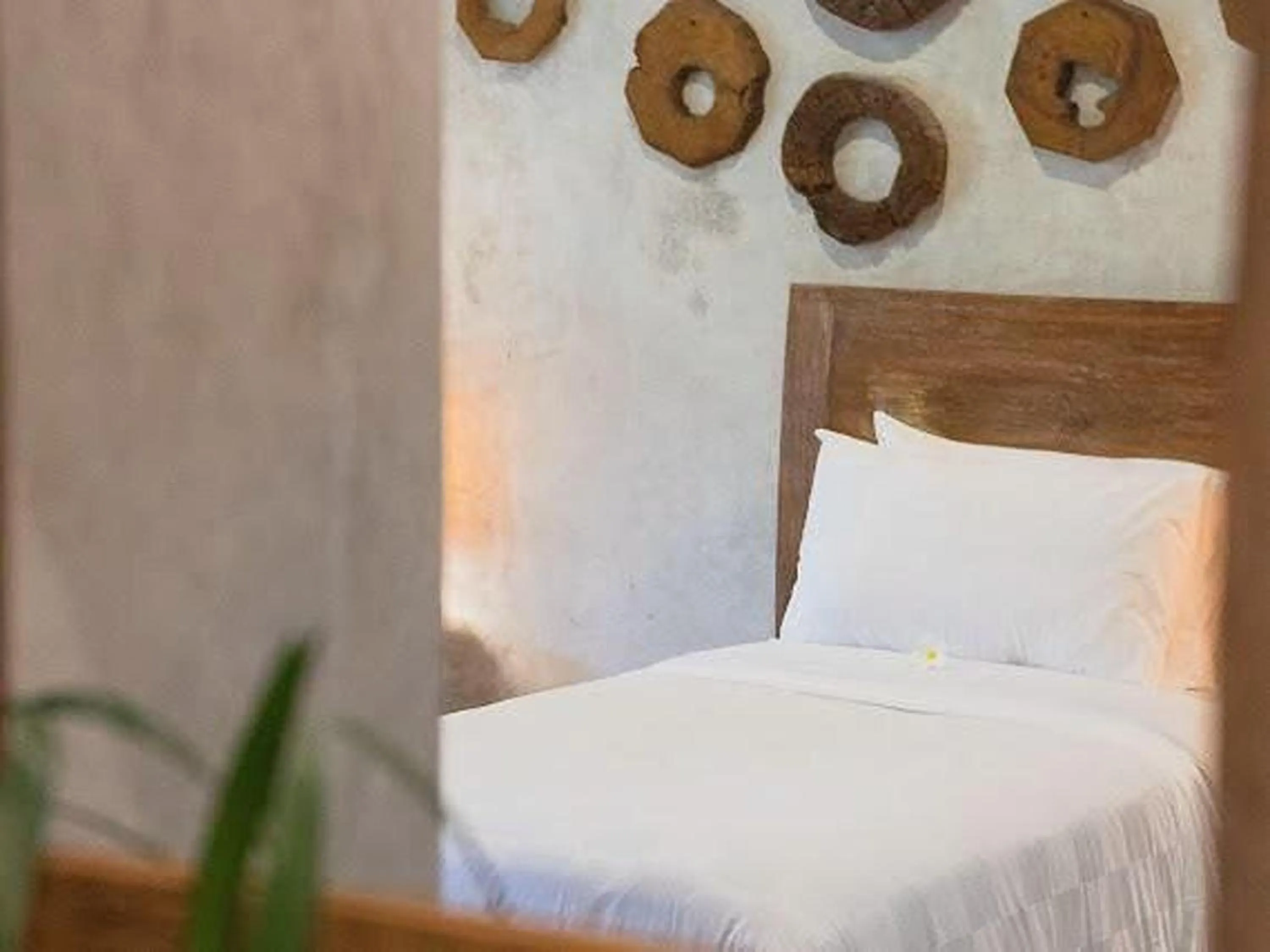 Bed in Nayaka Living Ubud