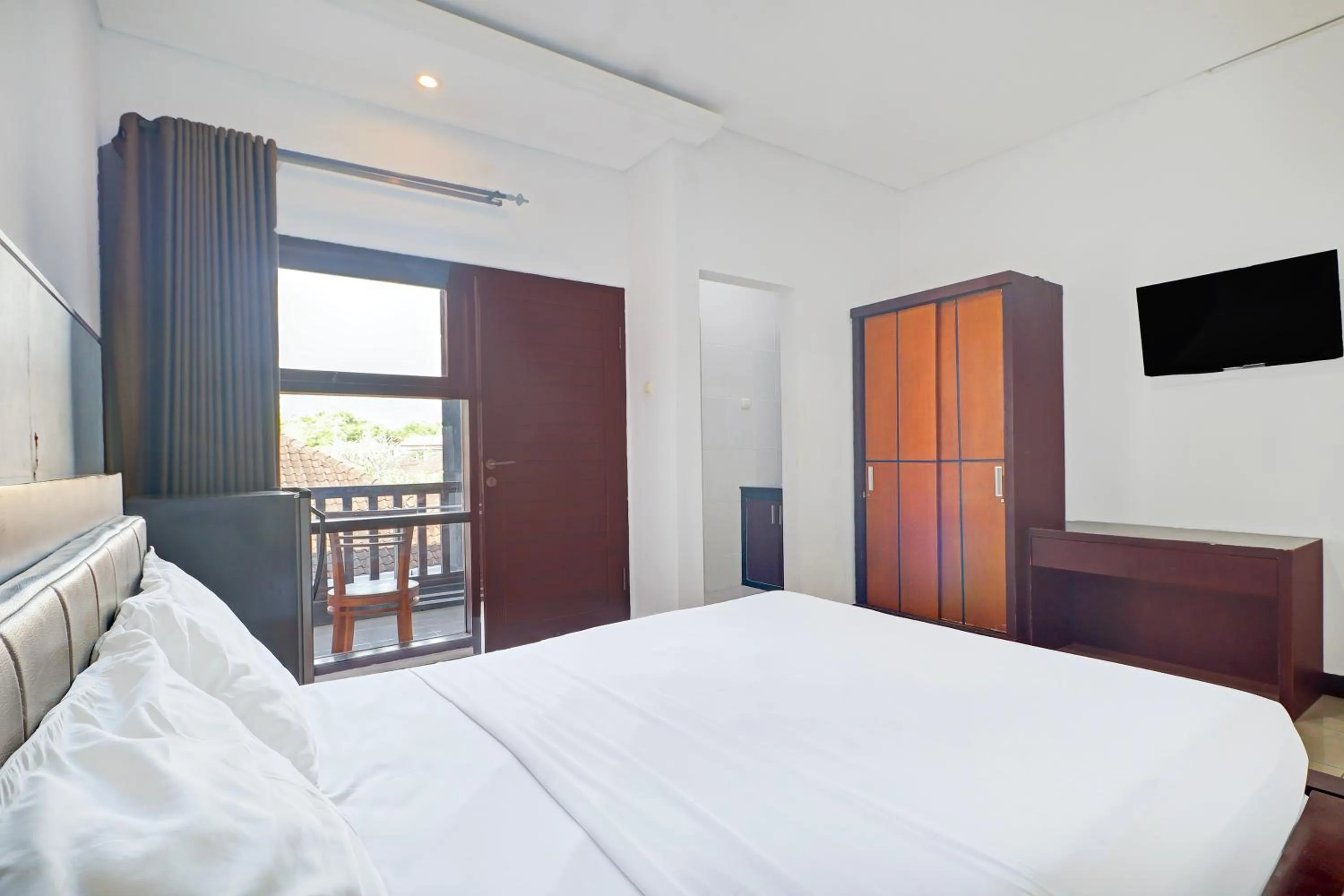 Photo of the whole room, Bed in Collection O Bali near Keonganan Beach formerly New Asta Graha Homestay