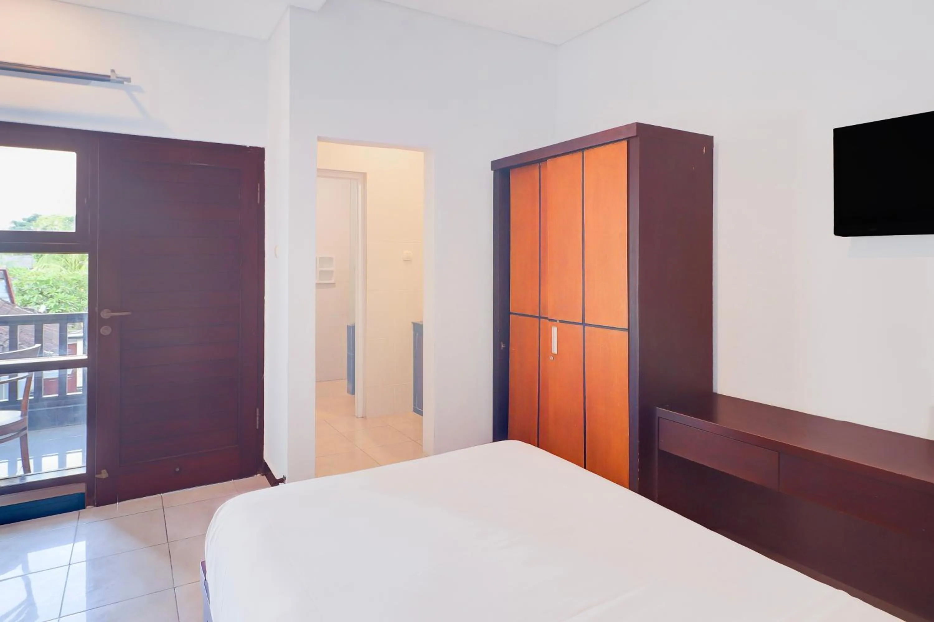 Photo of the whole room, Bed in Collection O Bali near Keonganan Beach formerly New Asta Graha Homestay