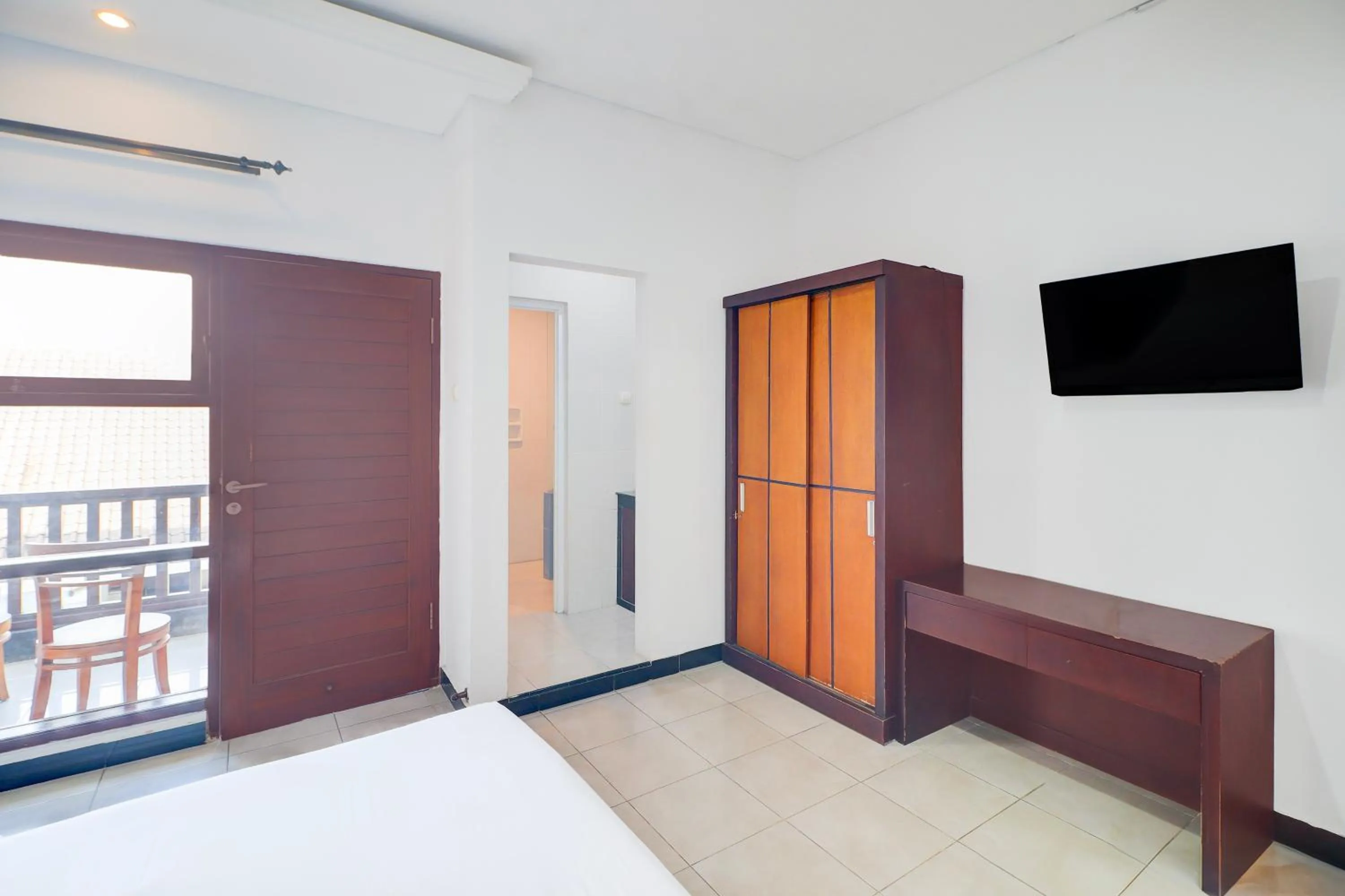 Photo of the whole room, Bed in Collection O Bali near Keonganan Beach formerly New Asta Graha Homestay