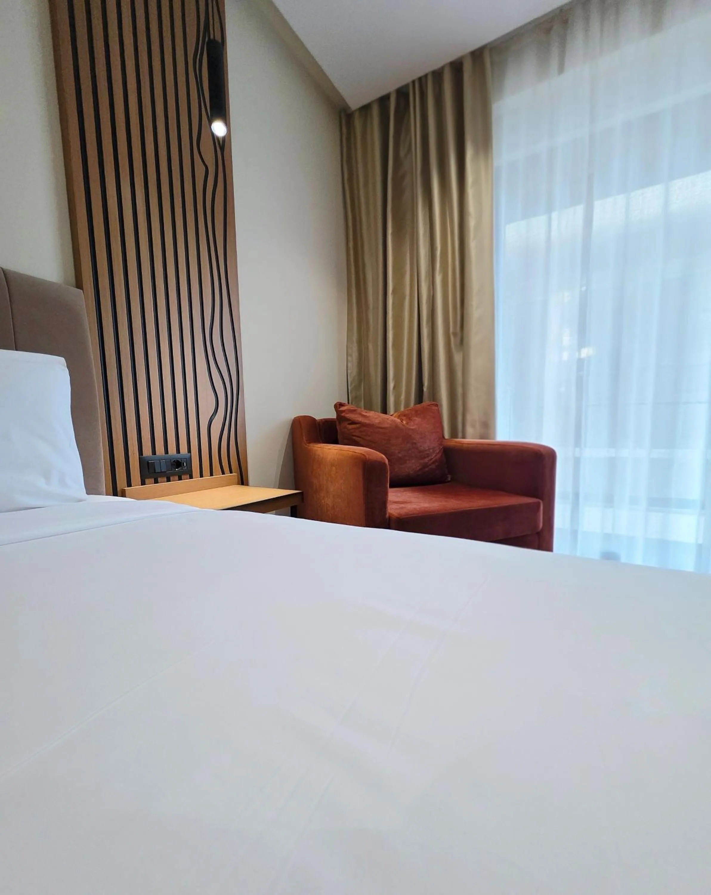 Bed in Valza Boutique Hotel