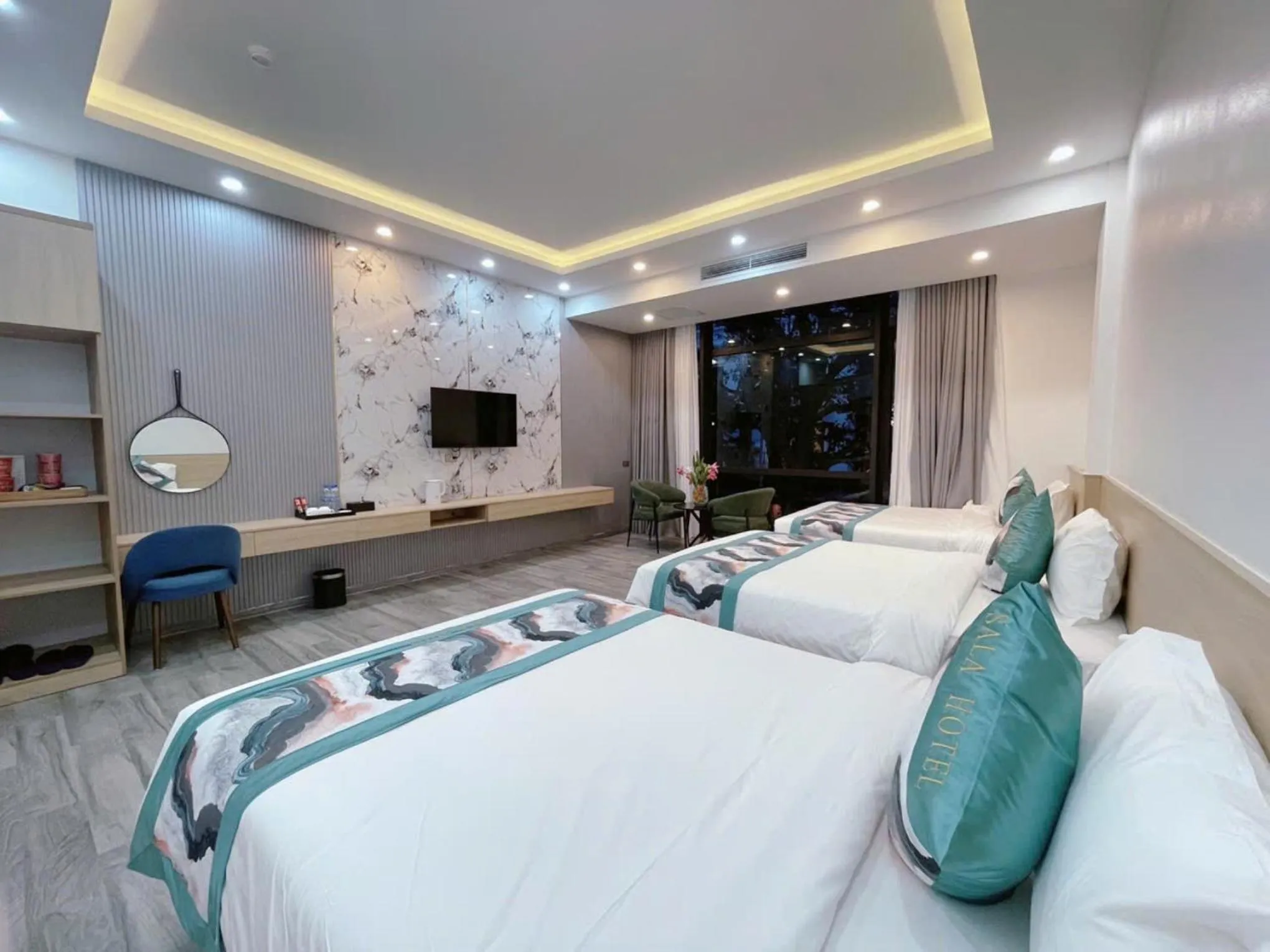 Bed in SALA HOTEL MÓNG CÁI