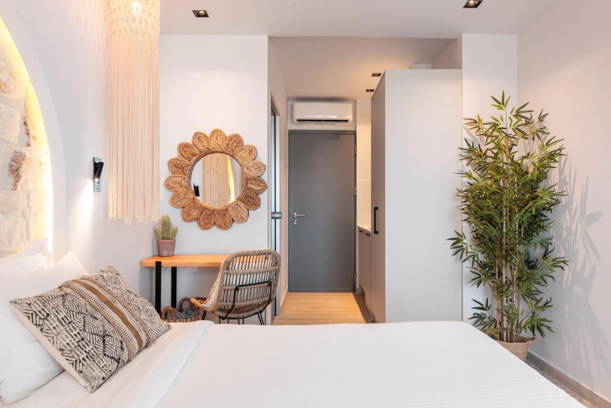 Bed in Amalthia Luxury Suites