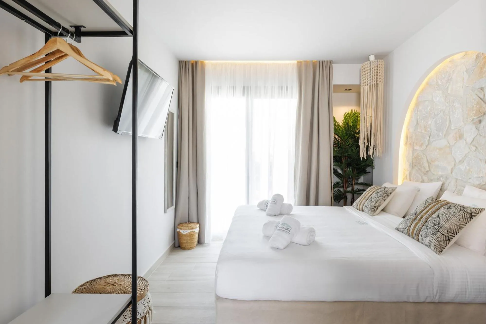 Bed in Amalthia Luxury Suites