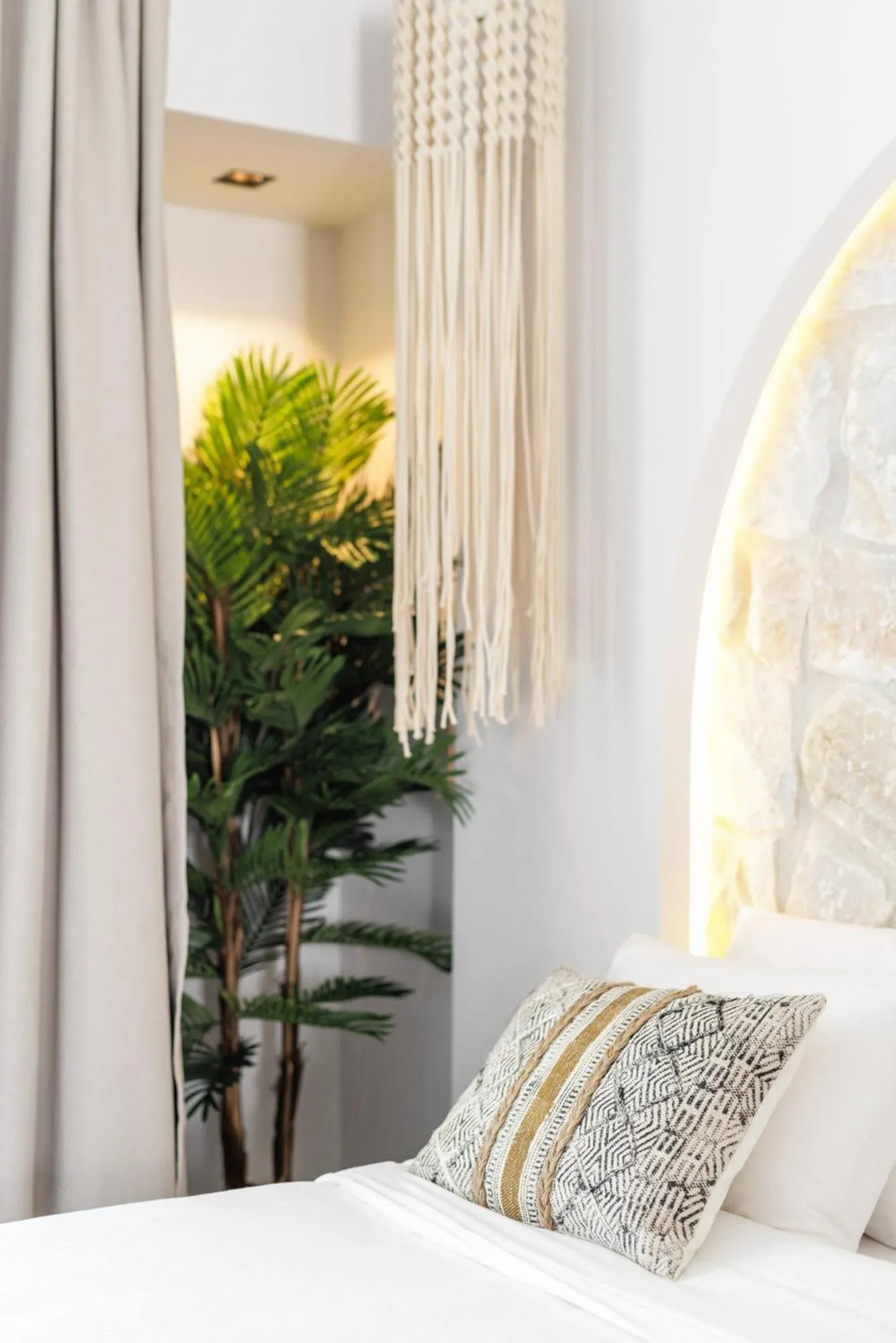 Bed in Amalthia Luxury Suites