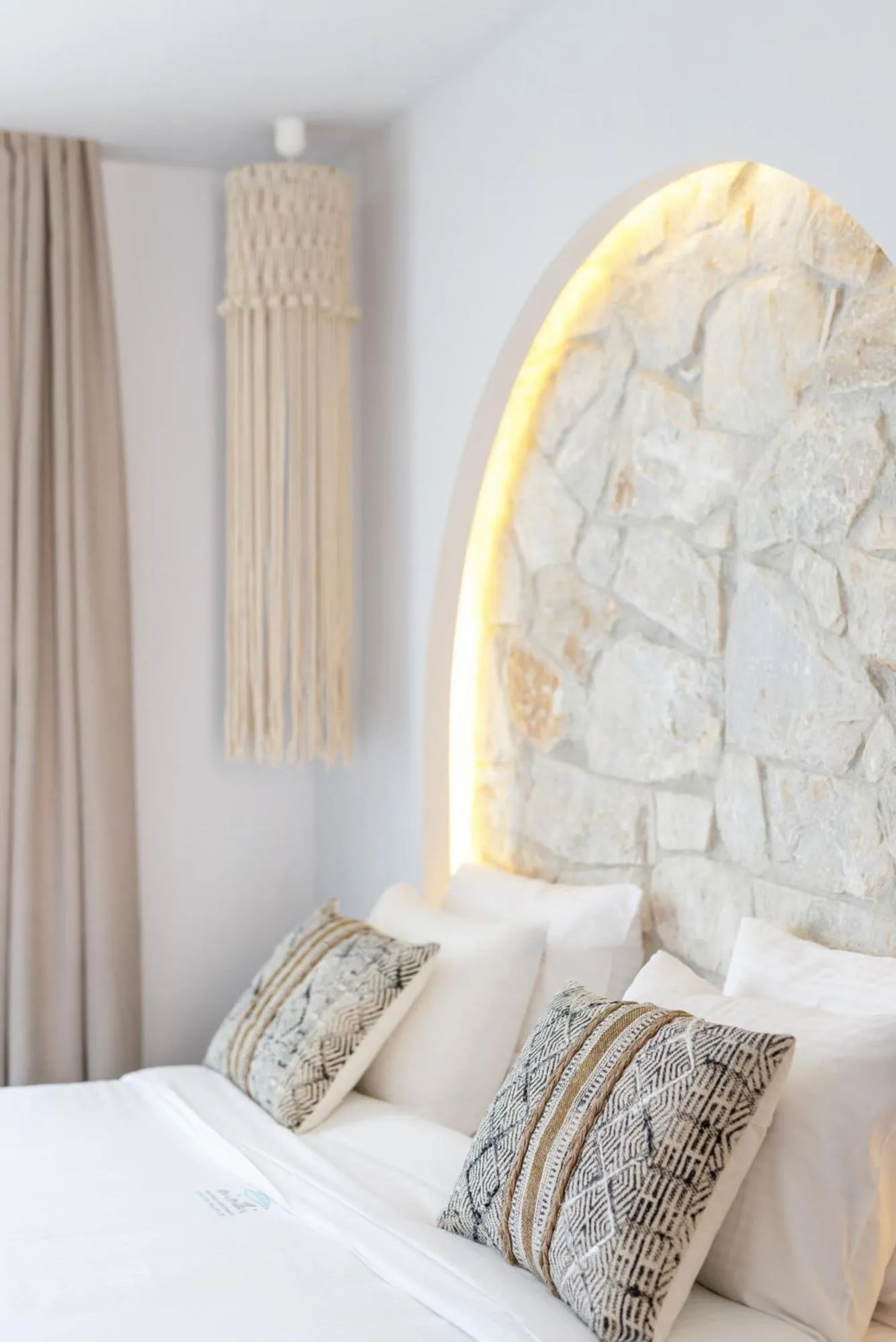 Bed in Amalthia Luxury Suites