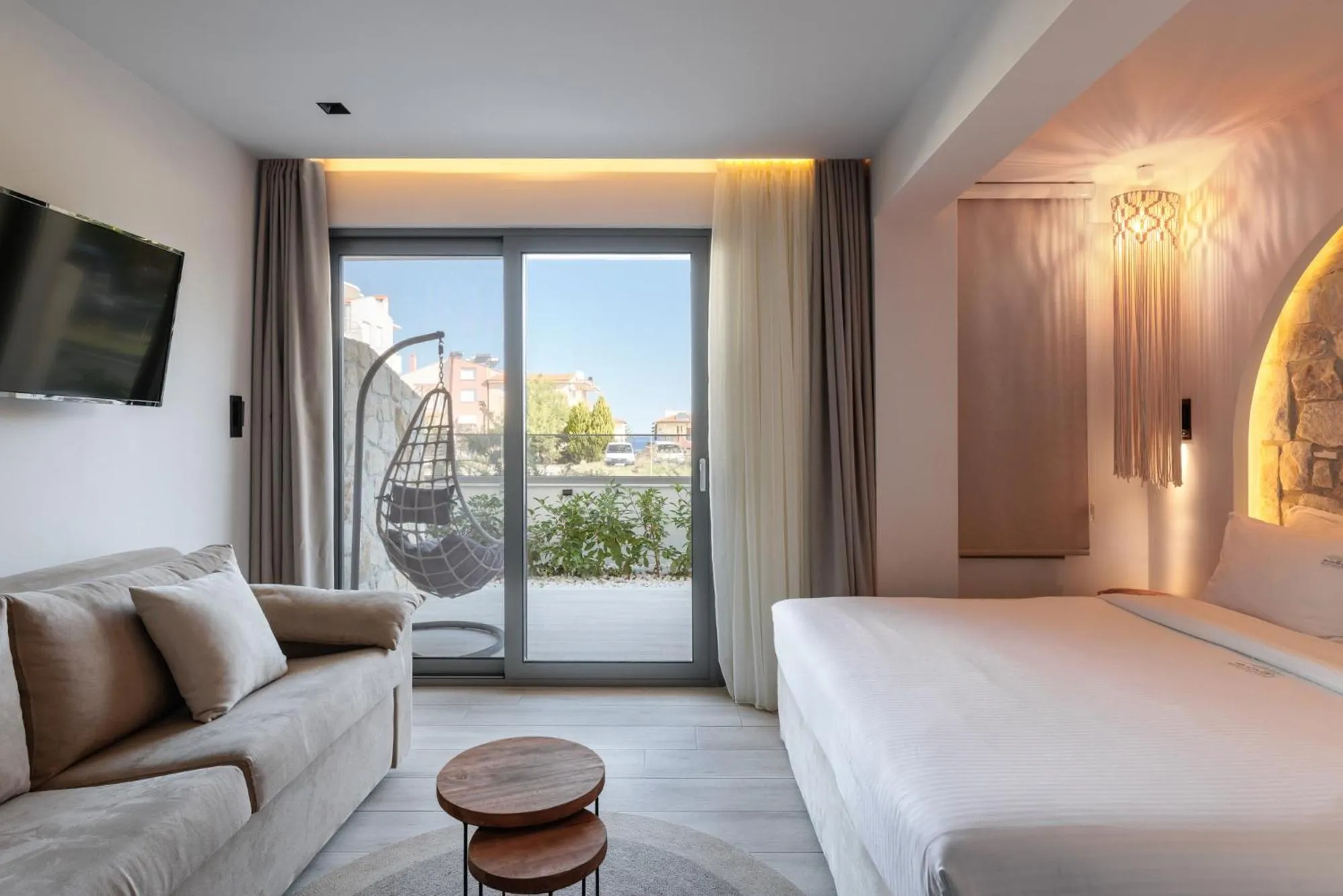 Bed in Amalthia Luxury Suites