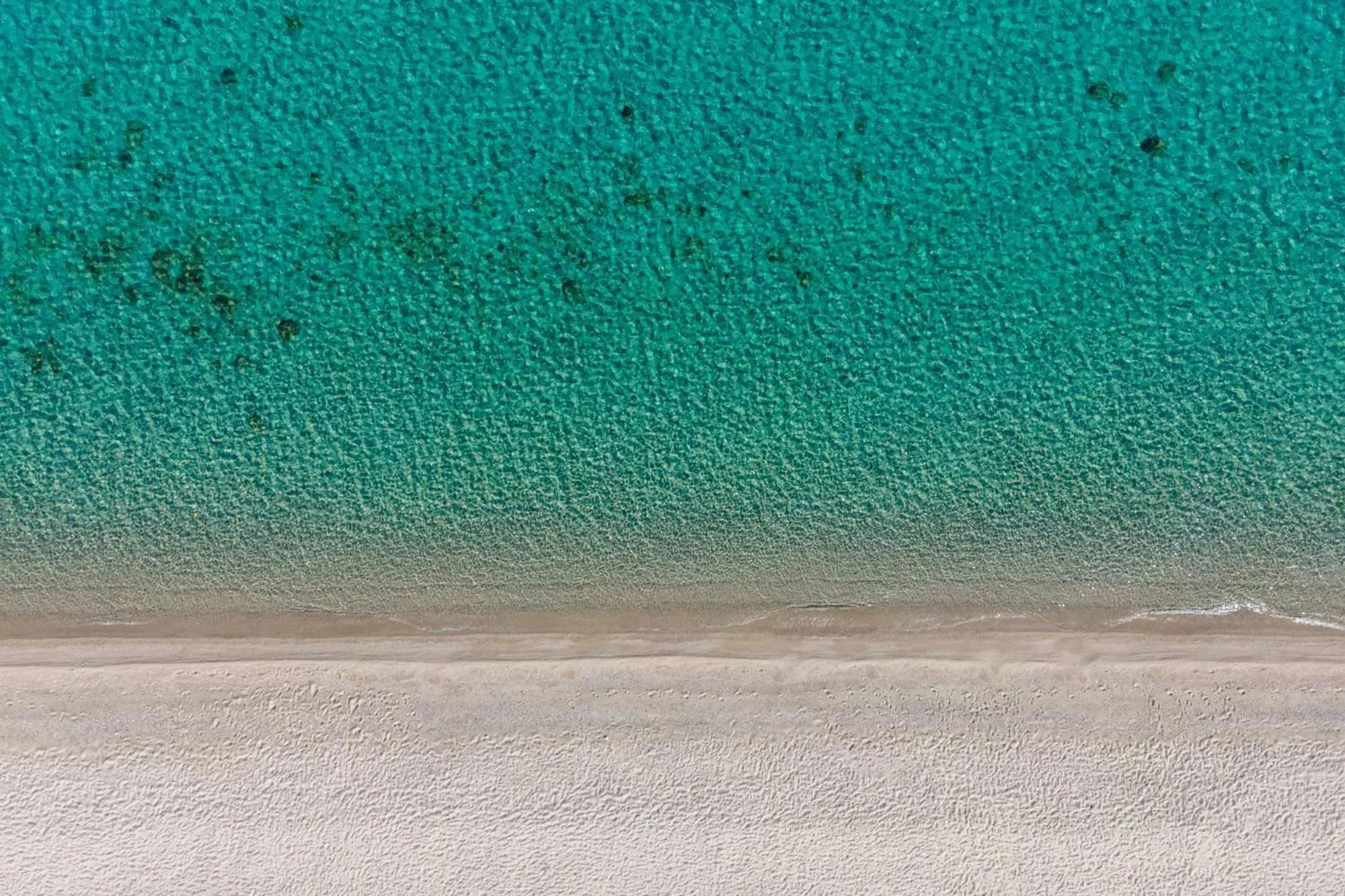 Beach in Amalthia Luxury Suites