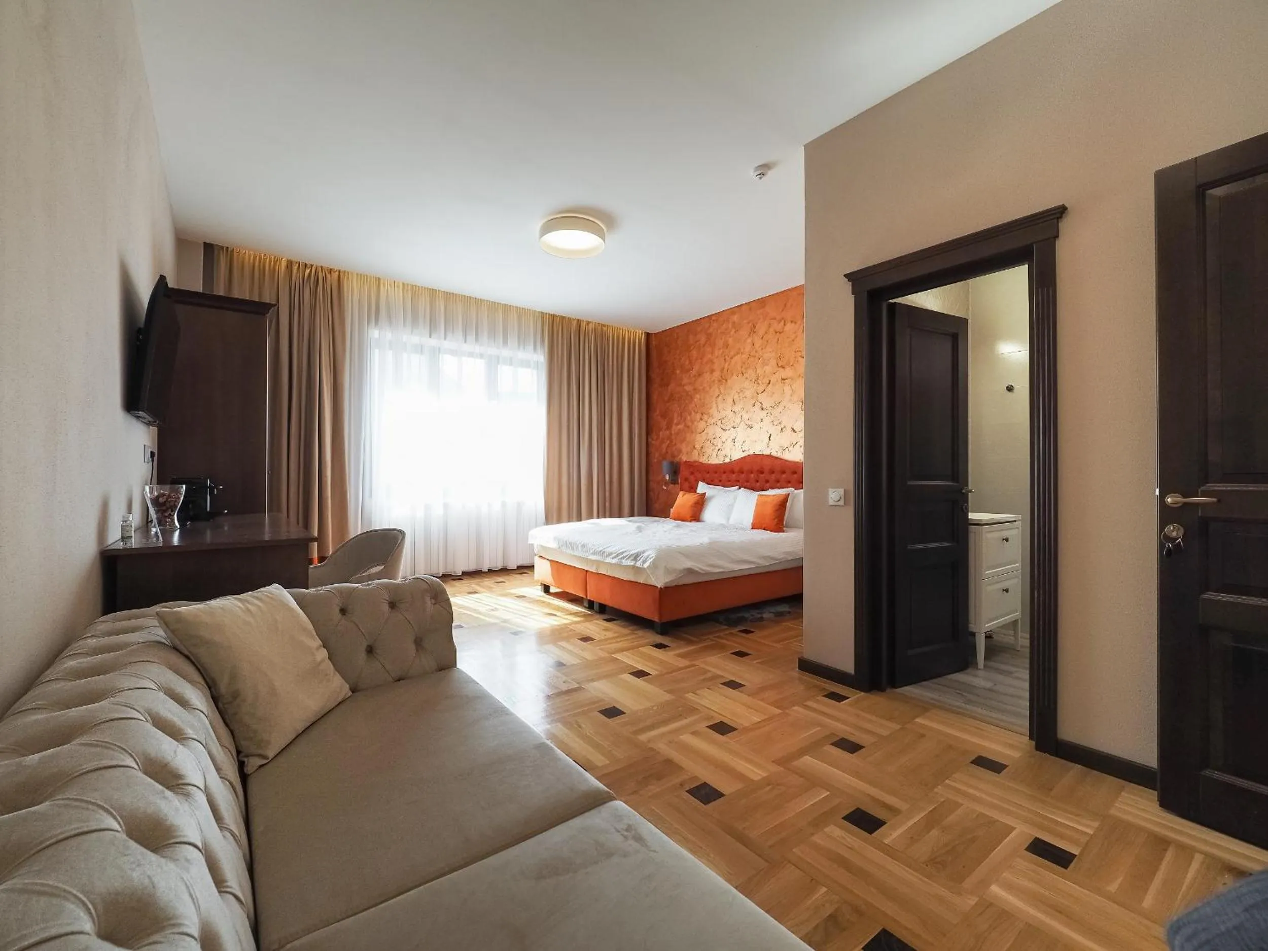 Photo of the whole room, Bed in Boutique Central