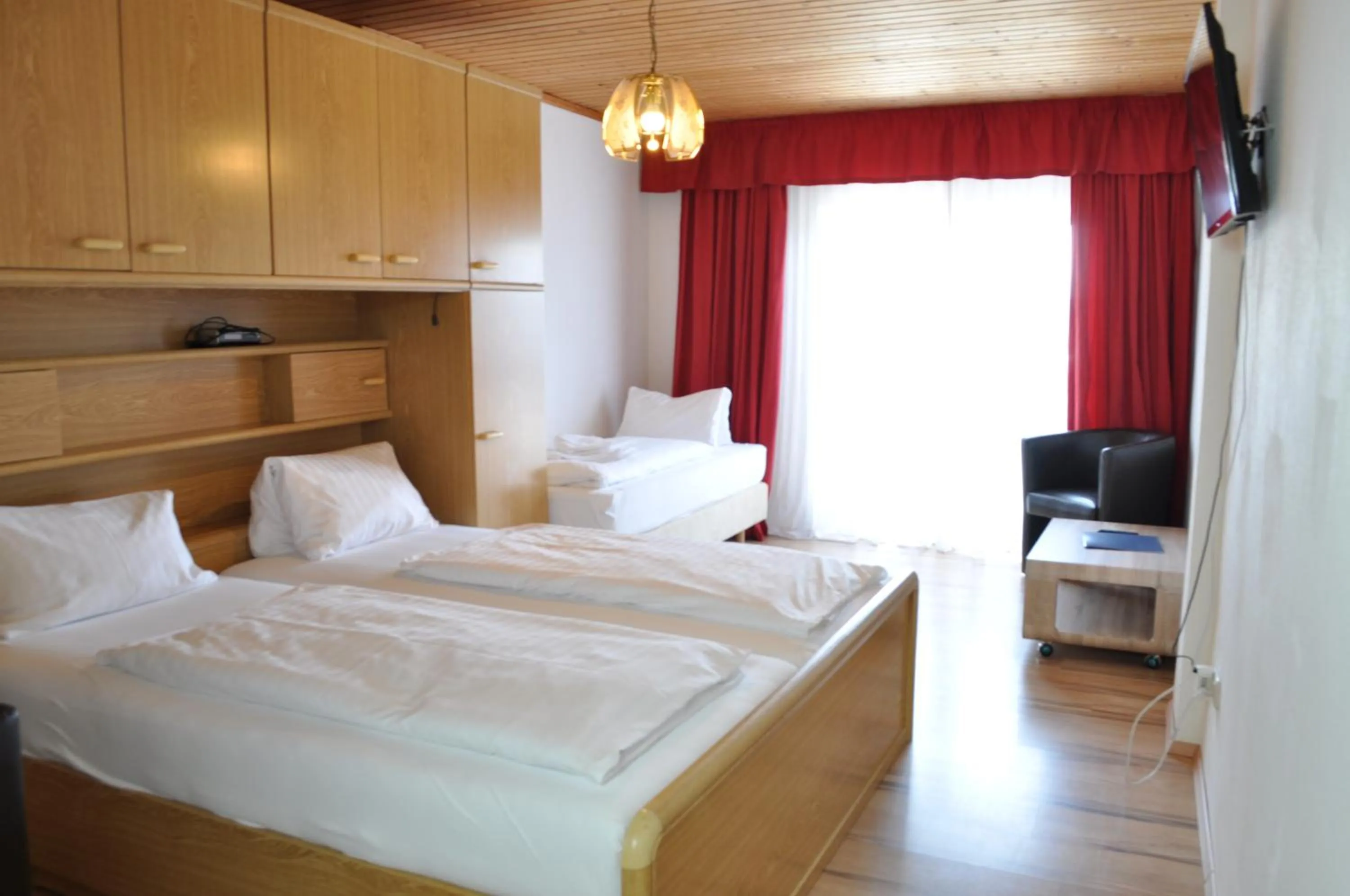Photo of the whole room, Bed in Gästehaus Herlinde