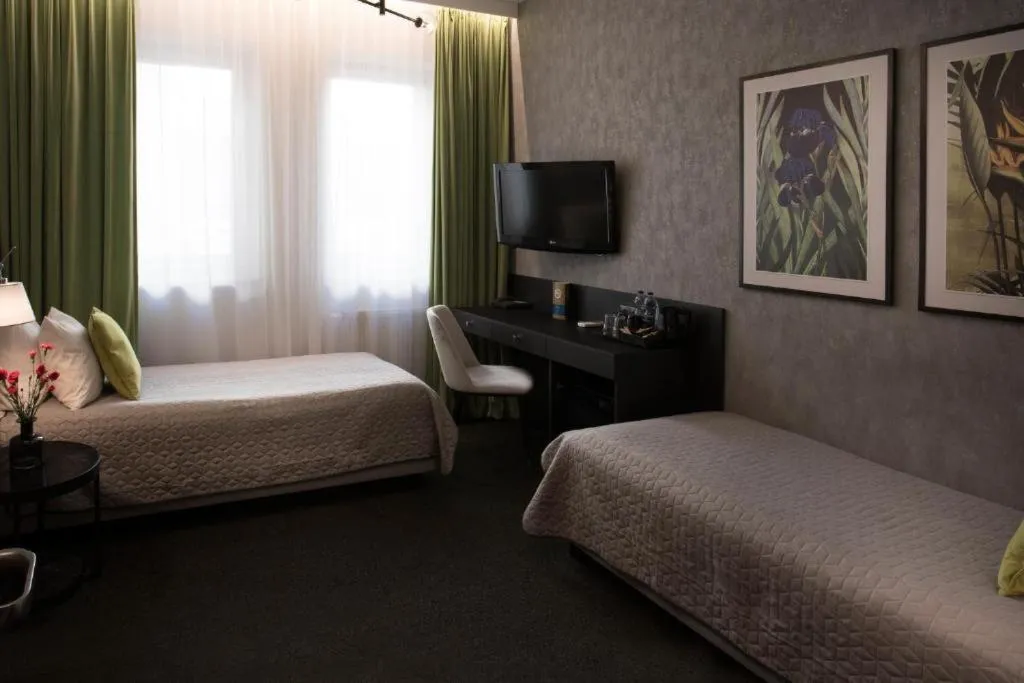 Photo of the whole room, Bed in Hotel Atrium