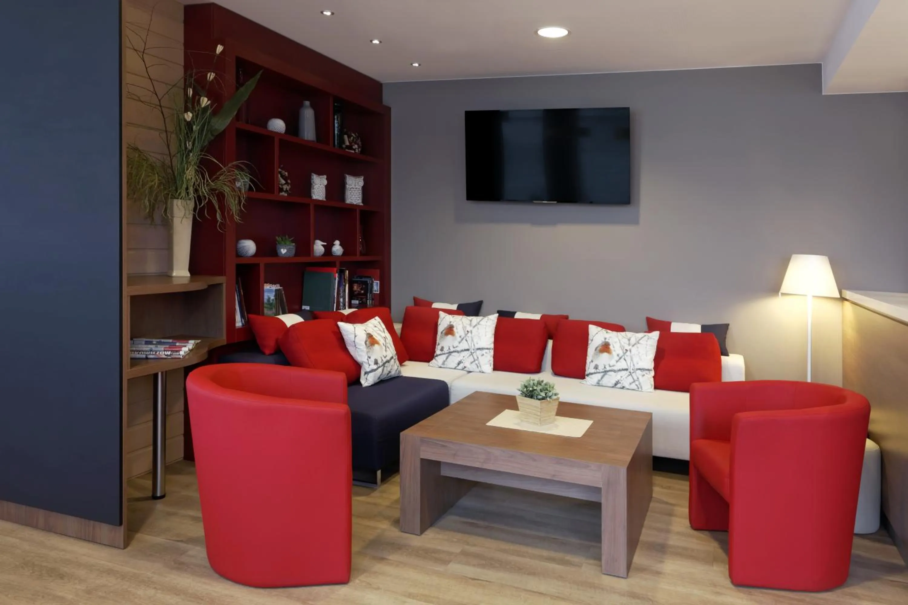 Communal lounge/ TV room in Campanile Wroclaw - Stare Miasto