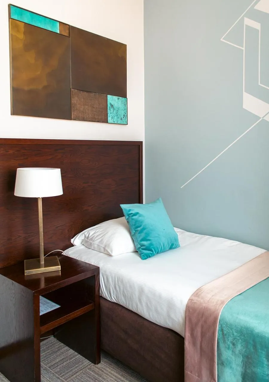 Bed in Europeum Hotel