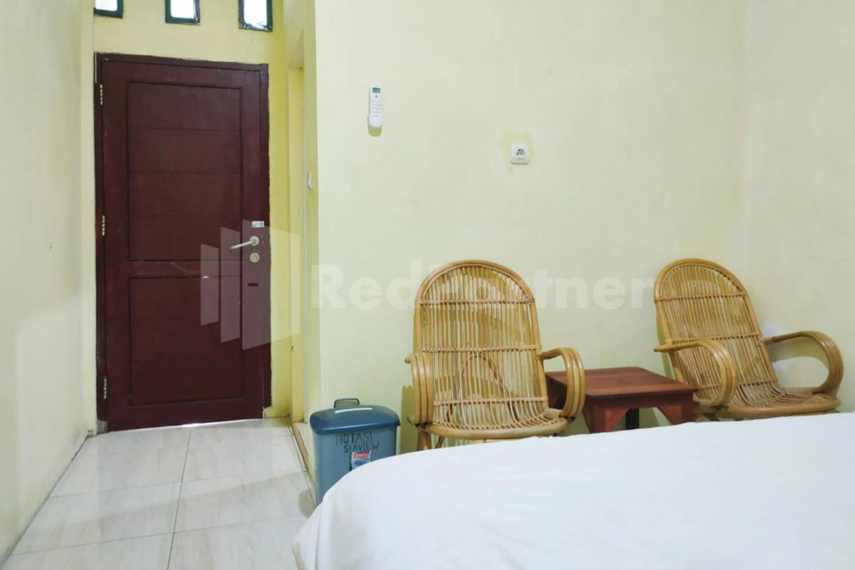 Bed in Ambarita Seaview RedPartner