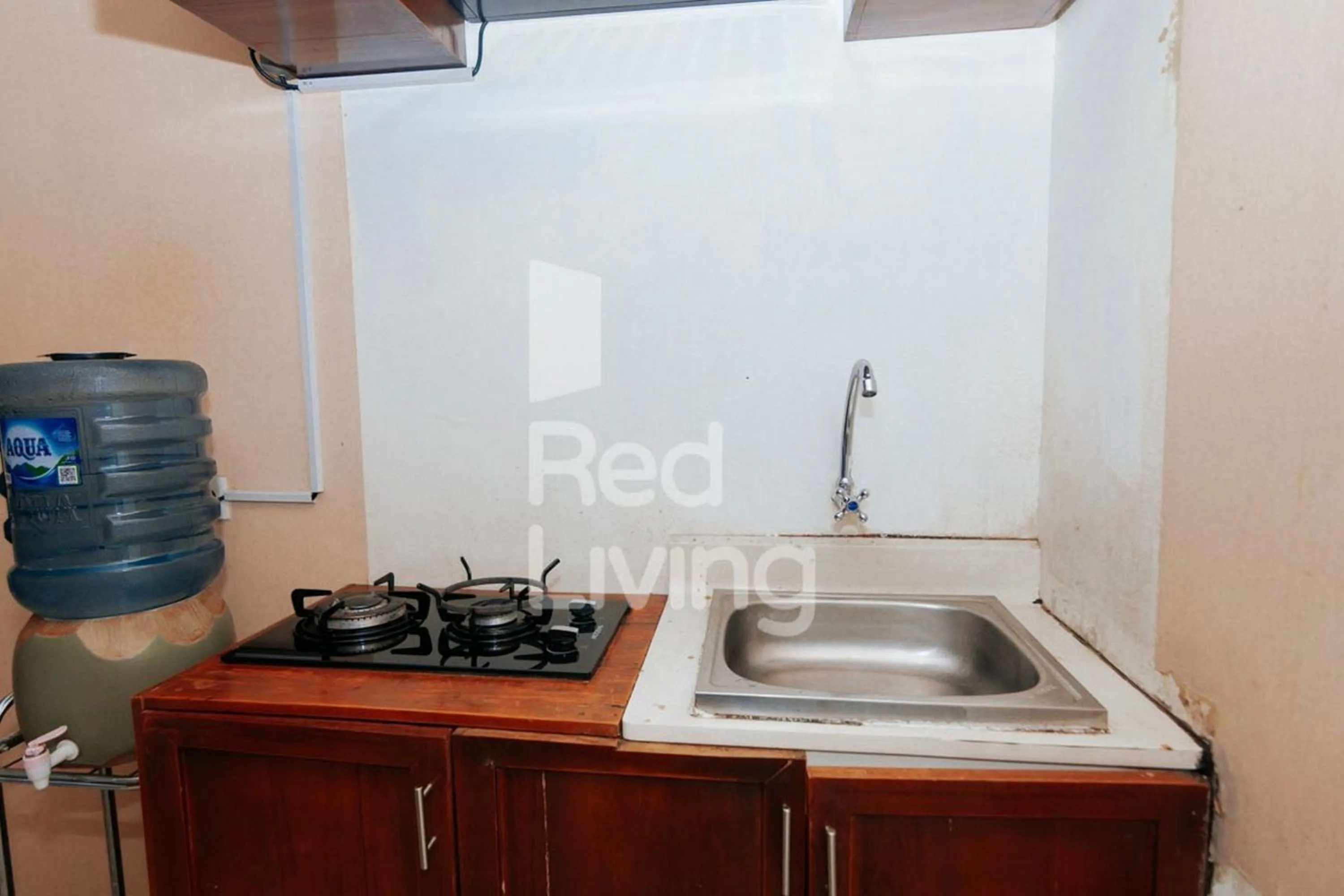 Kitchen or kitchenette in RedLiving Apartemen Bassura City - Aokla Property Tower Dahlia