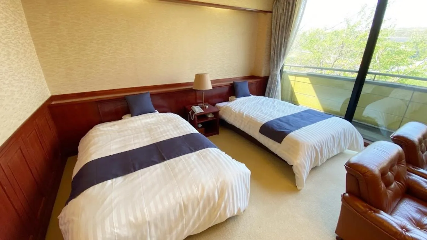 Bed in Tabinoyado Yakurai Rinsenkan