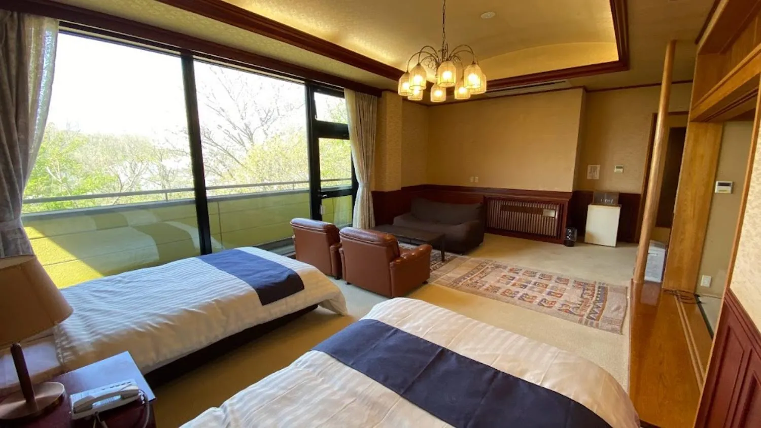 Bed in Tabinoyado Yakurai Rinsenkan