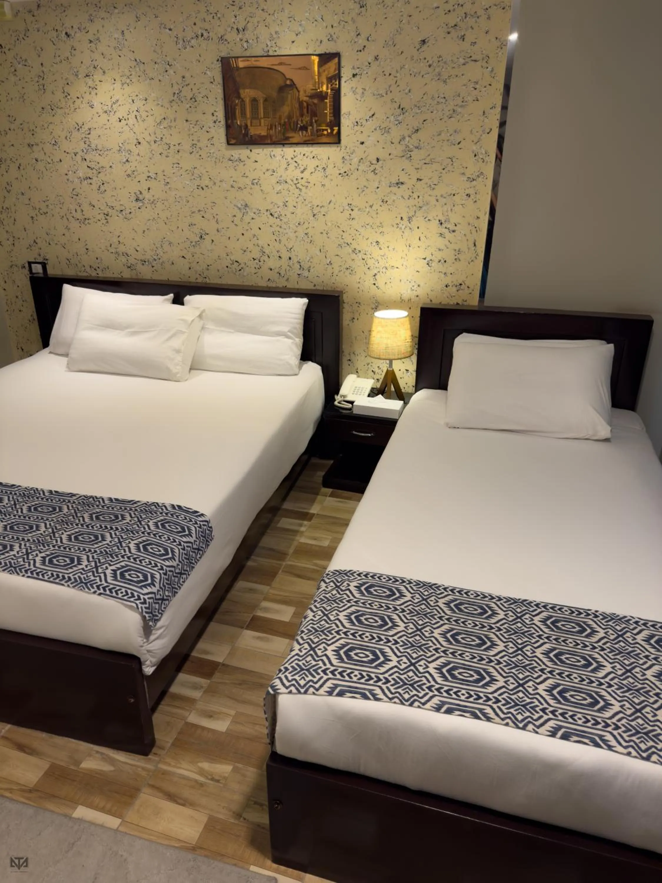Bed in Turquoise Pyramids & Grand Egyptian museum view Hotel