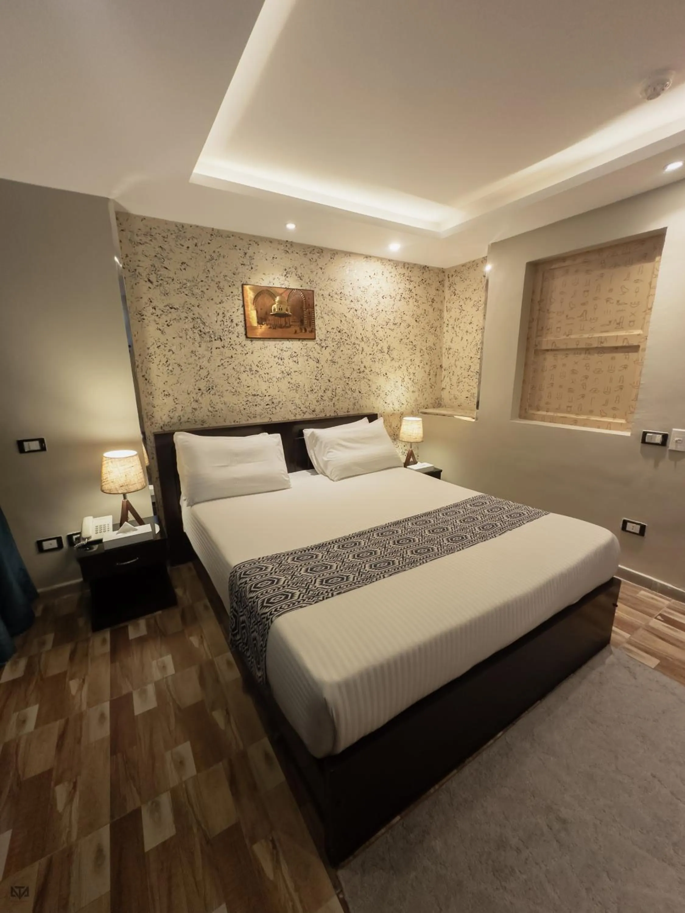 Bed in Turquoise Pyramids & Grand Egyptian museum view Hotel