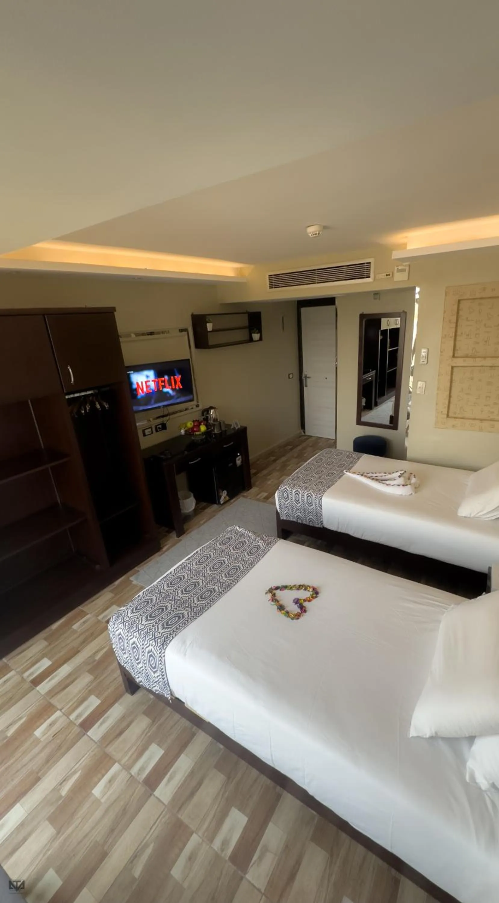 Bed in Turquoise Pyramids & Grand Egyptian museum view Hotel