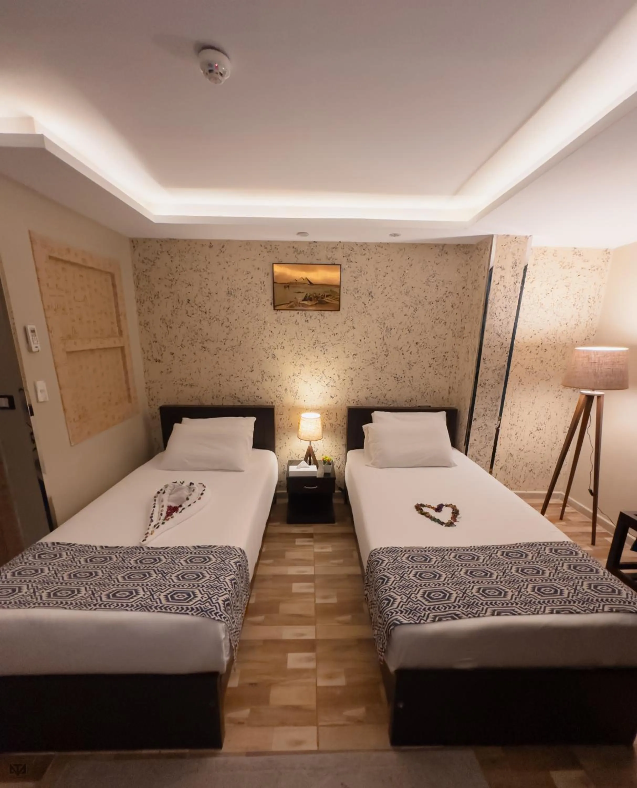 Bed in Turquoise Pyramids & Grand Egyptian museum view Hotel