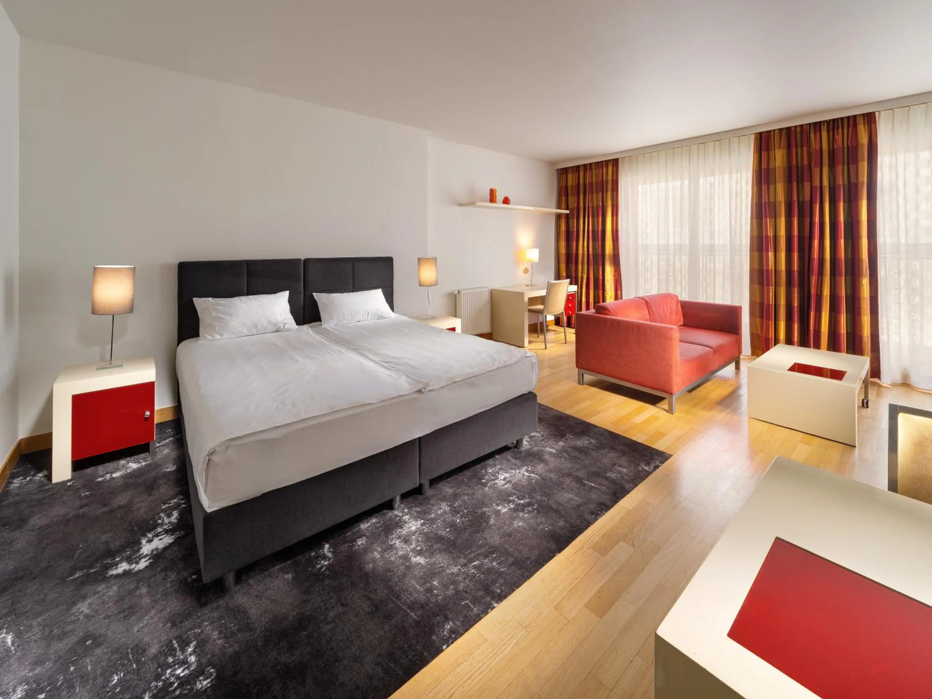 Seating area, Bed in Mamaison Residence Diana