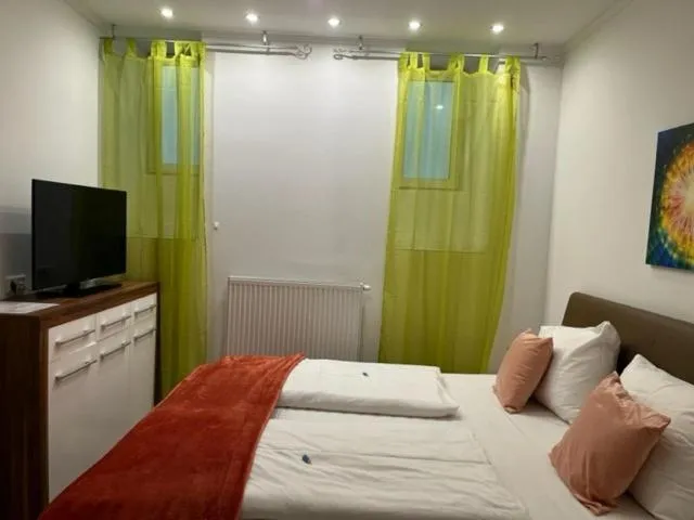 Bed in Grand Central Station Apartments I contactless check-in